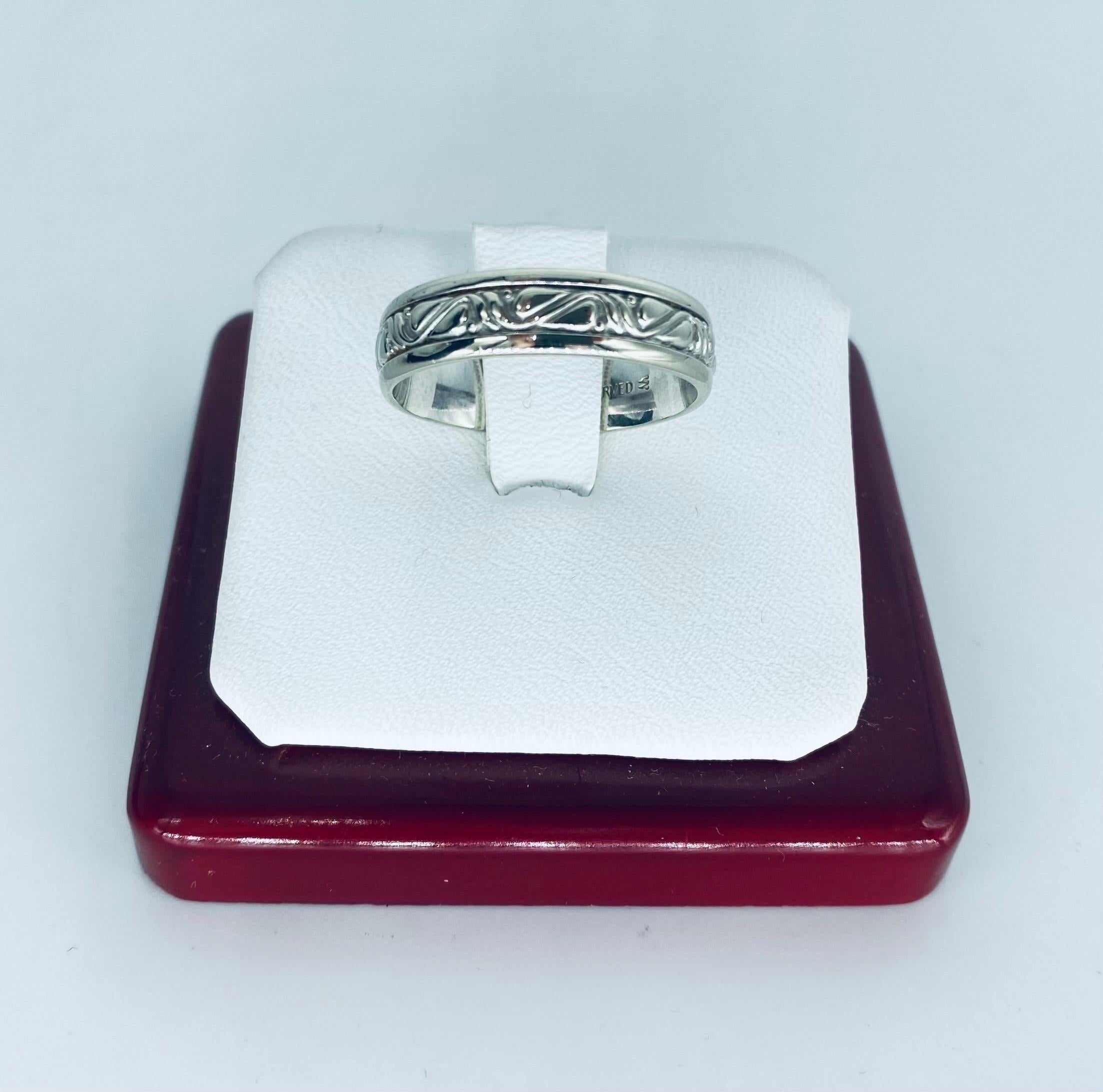 Artcarved 5.80mm Artistic Design Band Ring 14k White Gold. The ring is a size 9.5 and weights 6.2 grams 14k gold. The ring is made by Artcarved, and is very comfortable fit. Very rare to find in these rings.