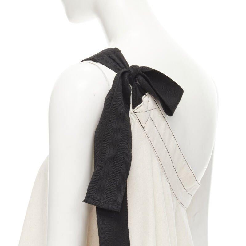 ARTCLUB natural beige 100% linen black one shoulder tent dress  S
Reference: KEDG/A00111
Brand: Artclub
Model: Tent dress
Material: Linen
Color: Beige
Pattern: Solid
Extra Details: Self tie shoulder strap. Dual side seam pockets
Made in: