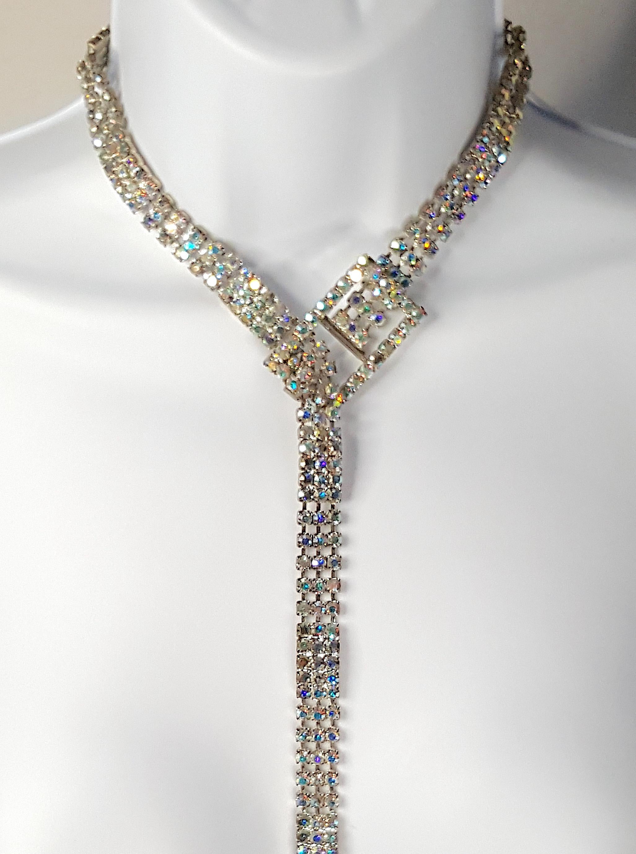 With settings and construction like Art Deco unsigned high-end crystal costume-jewelry by Bavarian-born blacksmith Henry Schreiner (1898-1954), this mid-century unsigned silver-soldered three-strand 35-inch-long piece with a prong-less buckle