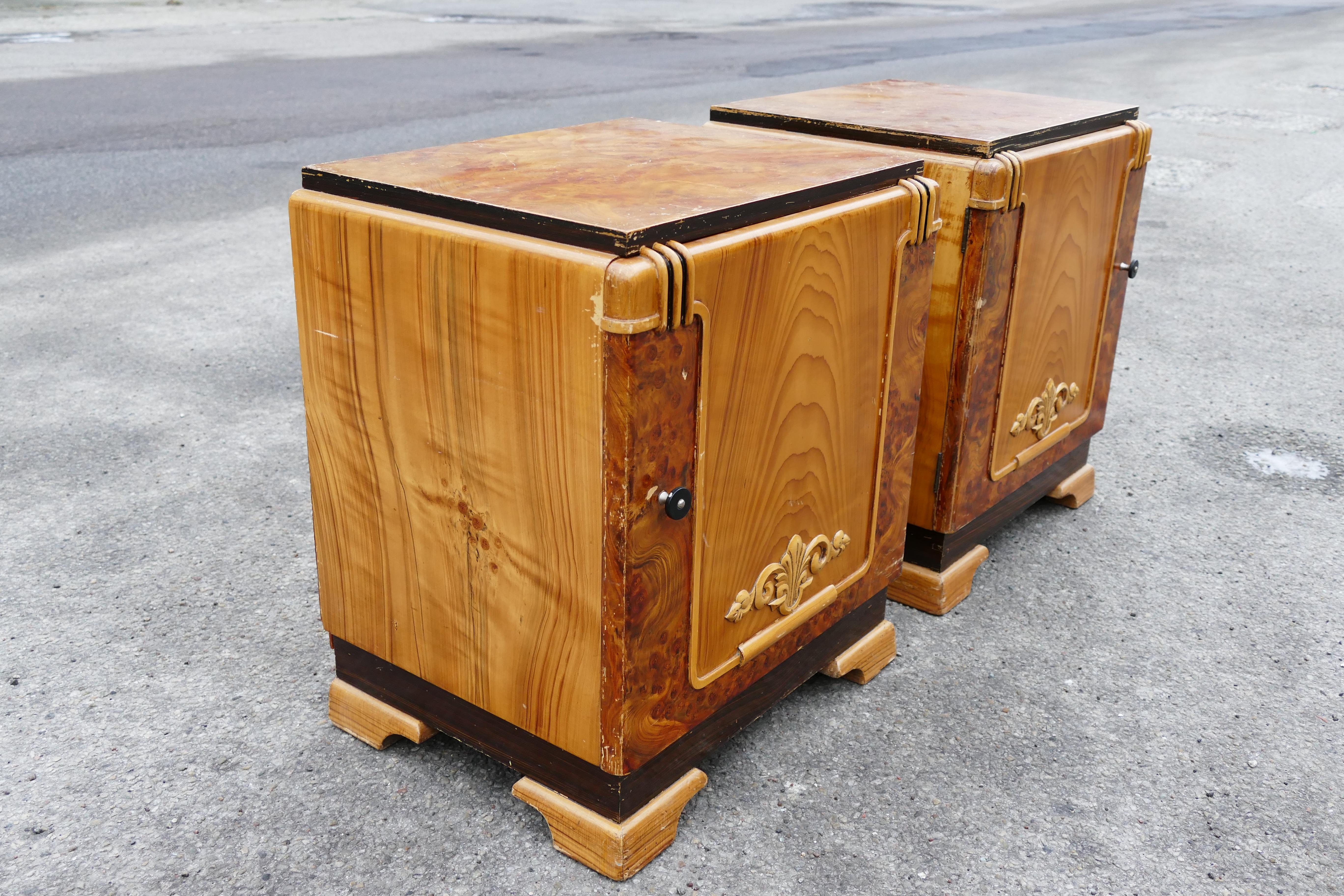 A pair of Mid-Century Modern nightstands with a and a spacious storage unit. Beautiful patinated from 1940s.