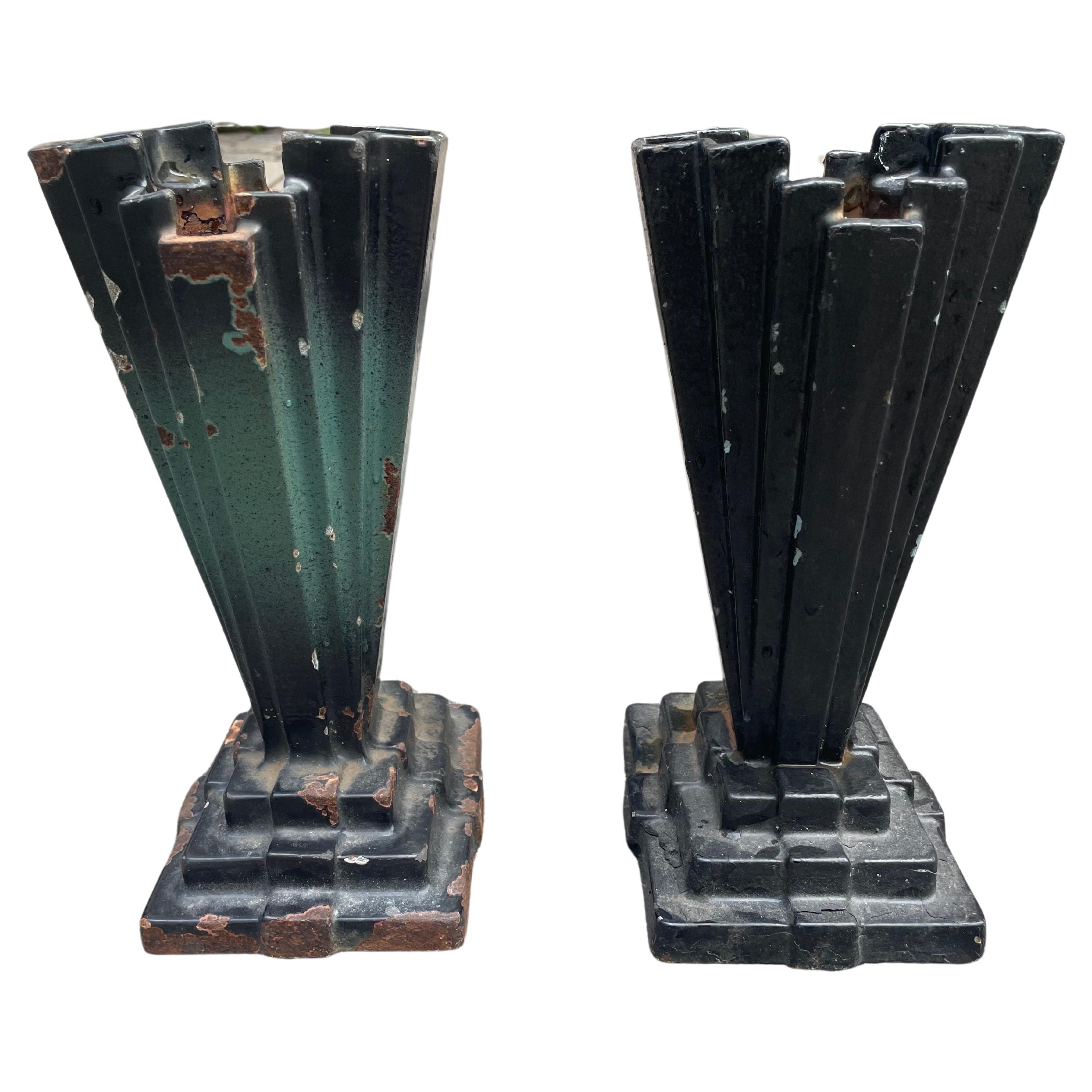 The timeless elegance of the 1920s with a remarkable pair of patinated cast iron Art Deco mortuary vases from the renowned Swedish company, Husqvarna. These exquisite vases exude both beauty and melancholy, capturing the essence of a bygone era with