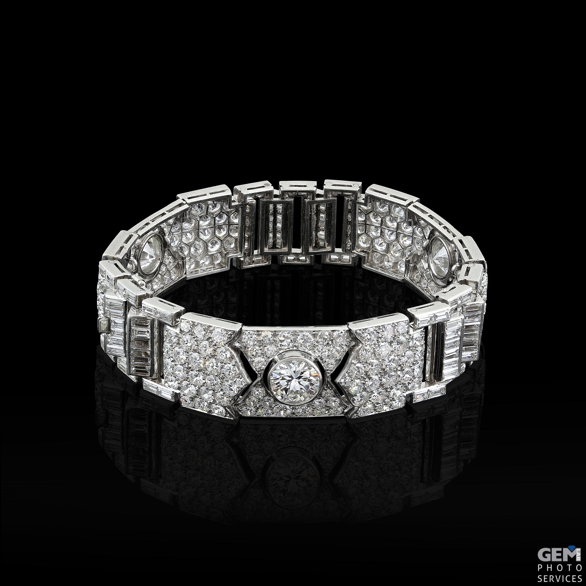 Unique Art deco Platinum bracelet with top quality diamonds signed L C

There are not enough  words to describe this handmade crafted elegant bracelet back in the 1920's.

We presume this bracelet is LACLOCHE as it has a LC stamp on the bracelet and