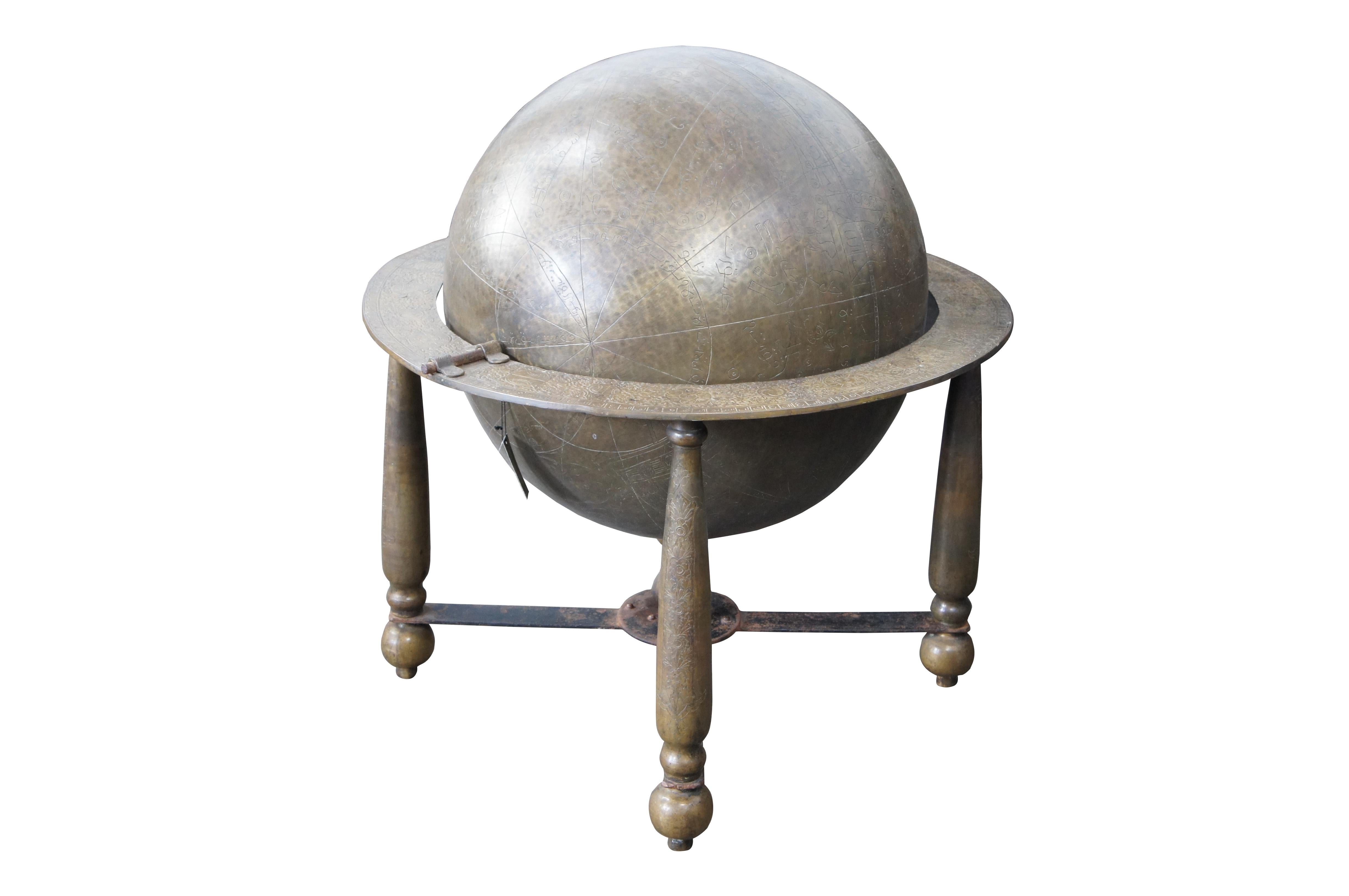 Islamic Celestial Globe by Arte International Furnishings. 

An exceptional large brass Islamic Celestial Globe. The hammered brass sphere constructed from two hemispheres with engraved scales and constellations, pivoted within horizontal ring