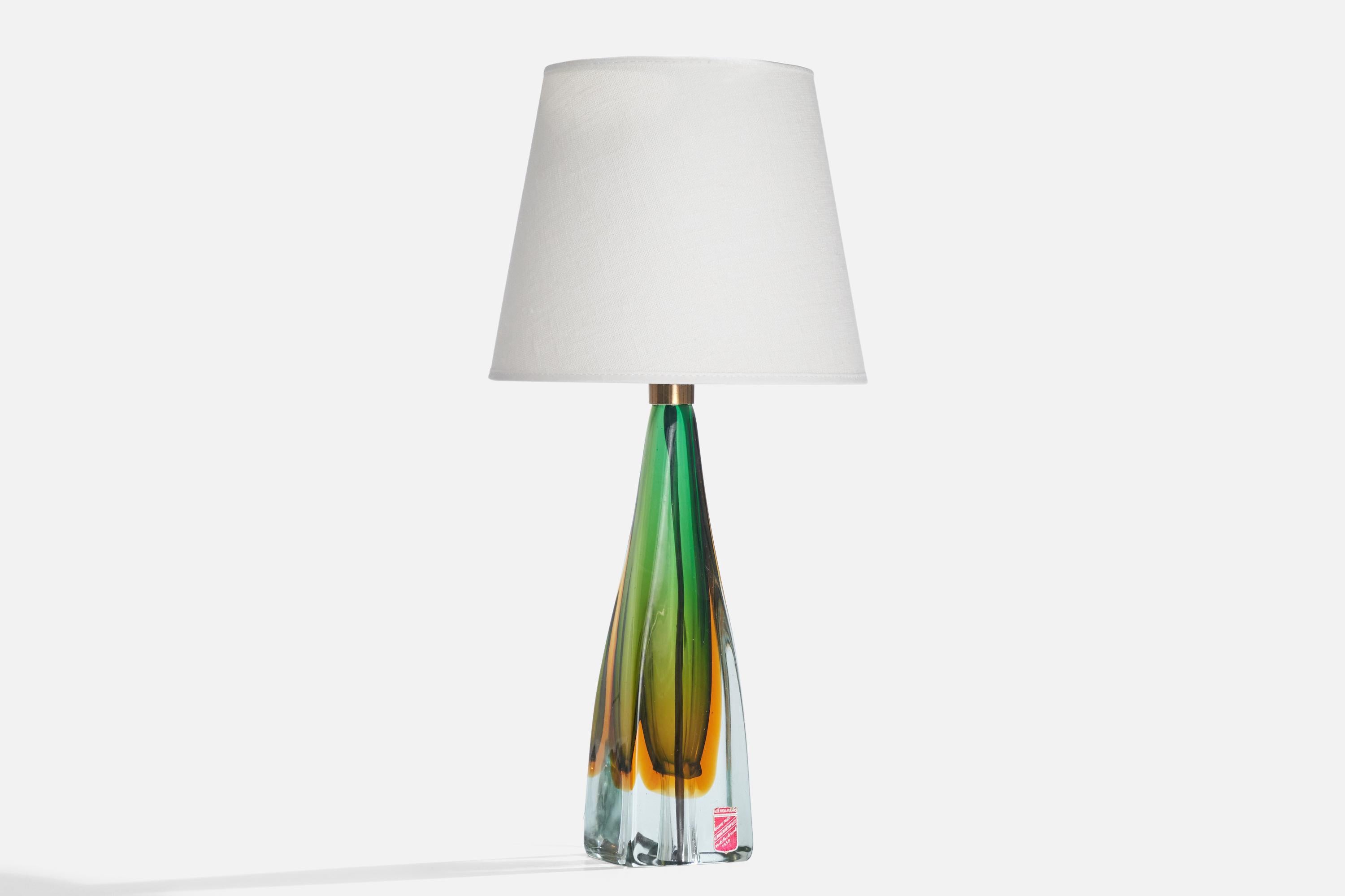 A multi-color blown glass table lamp produced by Arte Nuova Murano Italy, c. 1950s.

Dimensions of Lamp (inches):  12.5“ H x 3” W x 2.375” DDimensions of Shade (inches):  5.625“ Top Diameter x  8“ Bottom Diameter x  6.75” H

Dimensions of Lamp with
