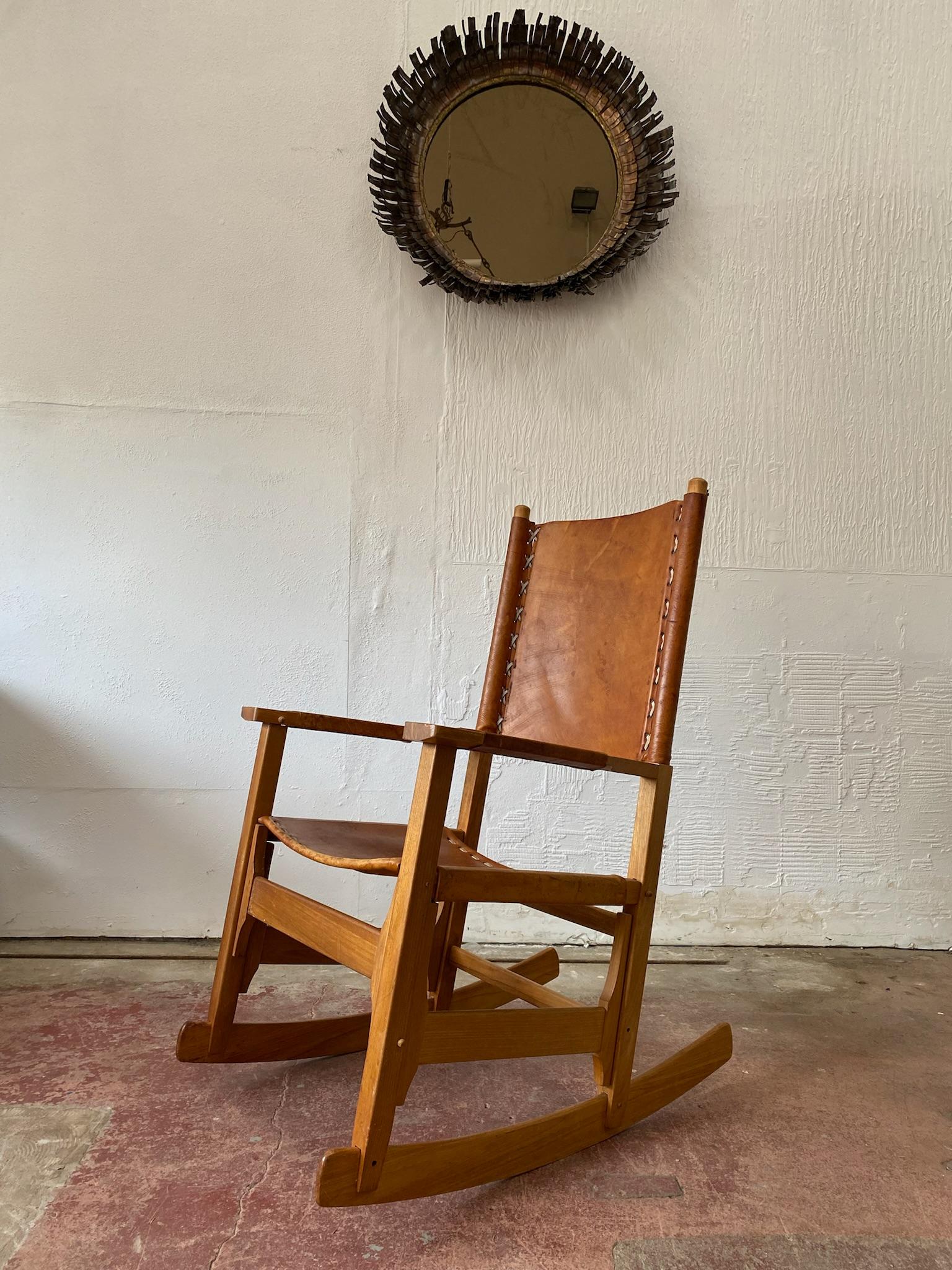 This rocking chair is designed by Biermann Werner for Arte Sano. German-born designer Werner Biermann settled in Colombia in the 1930s and founded a furniture factory that brought European and Scandinavian styles to South America.

The chair is made