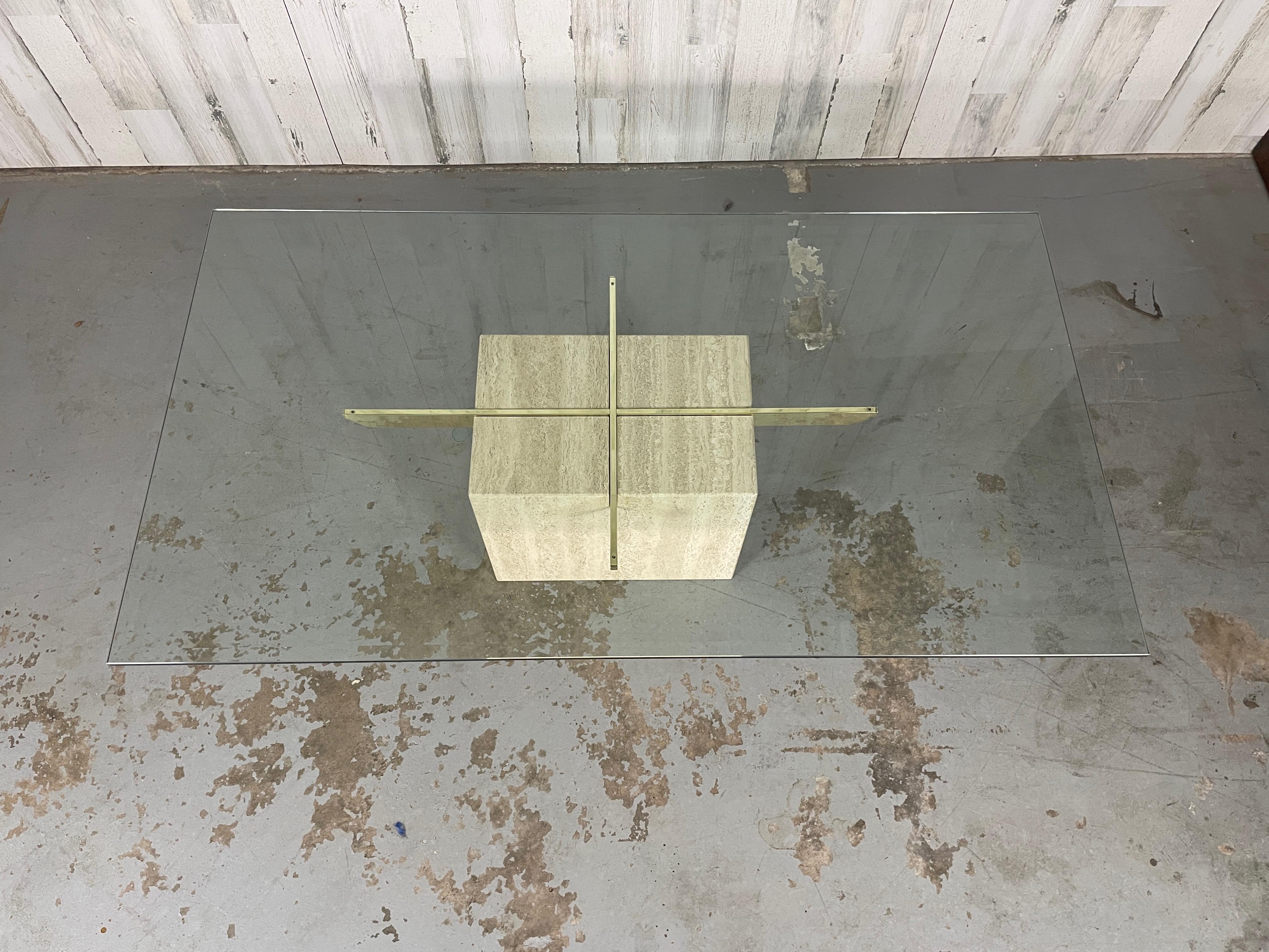 Rectangle Artedi Travertine and brass coffee/ cocktail table. Very good original condition with no chips. 
Base only measures: 31.5 L x 19.75 D x 14 H.