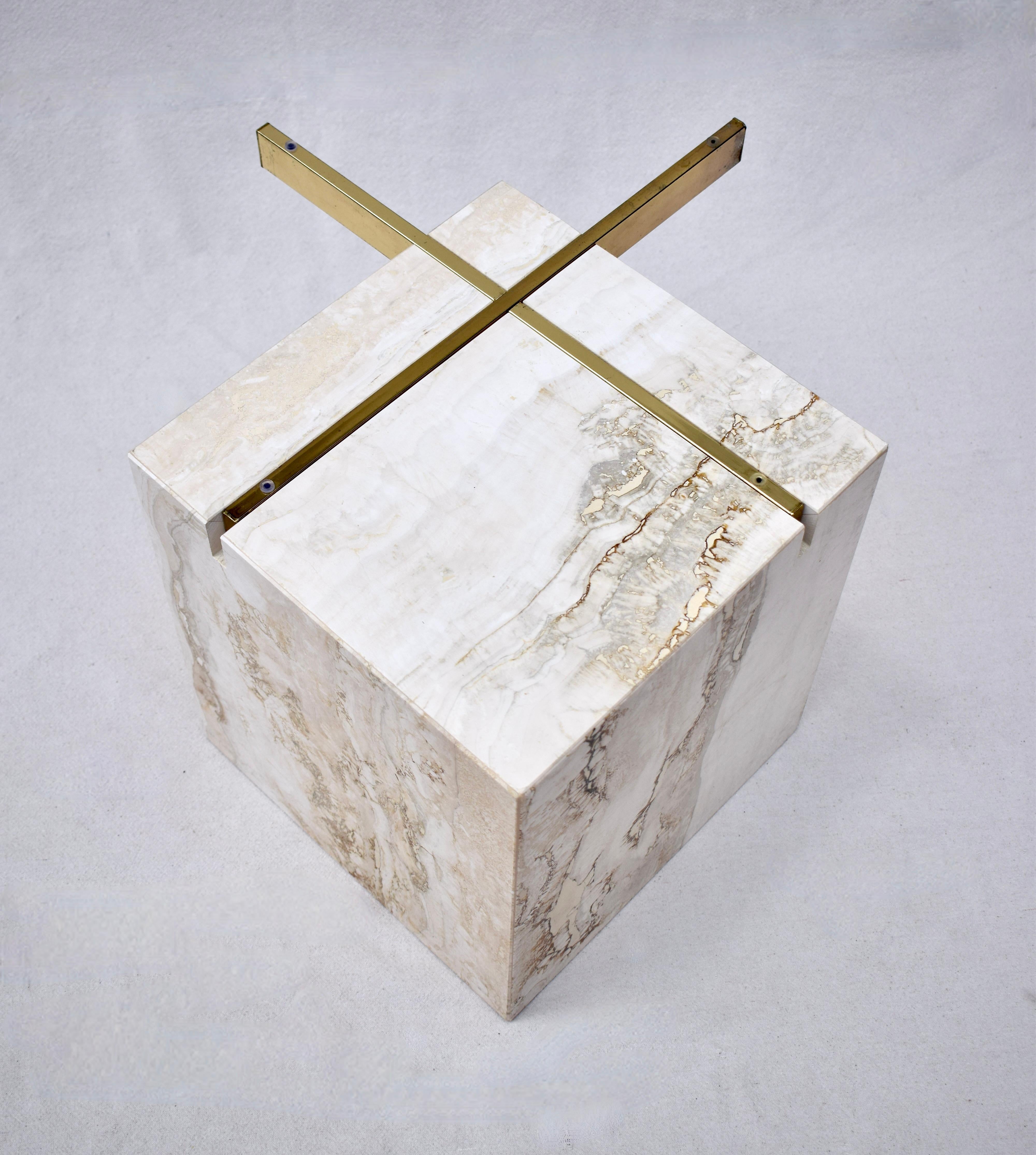 Mid-Century Modern Artedi travertine coffee or cocktail table with brass support and beveled glass top. Distinct striations throughout the impressive base. Circa 1970's, Italy.