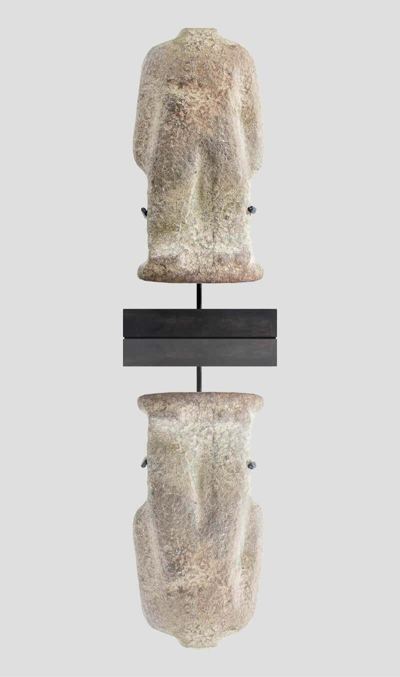 A human torso (lacking head) carved from a limestone [yet to be determined]; the enigmatic whole torso is strongly represented in an upright stance, arms purposefully rigid to each side. Acquired from a European source, the stone artefact is a