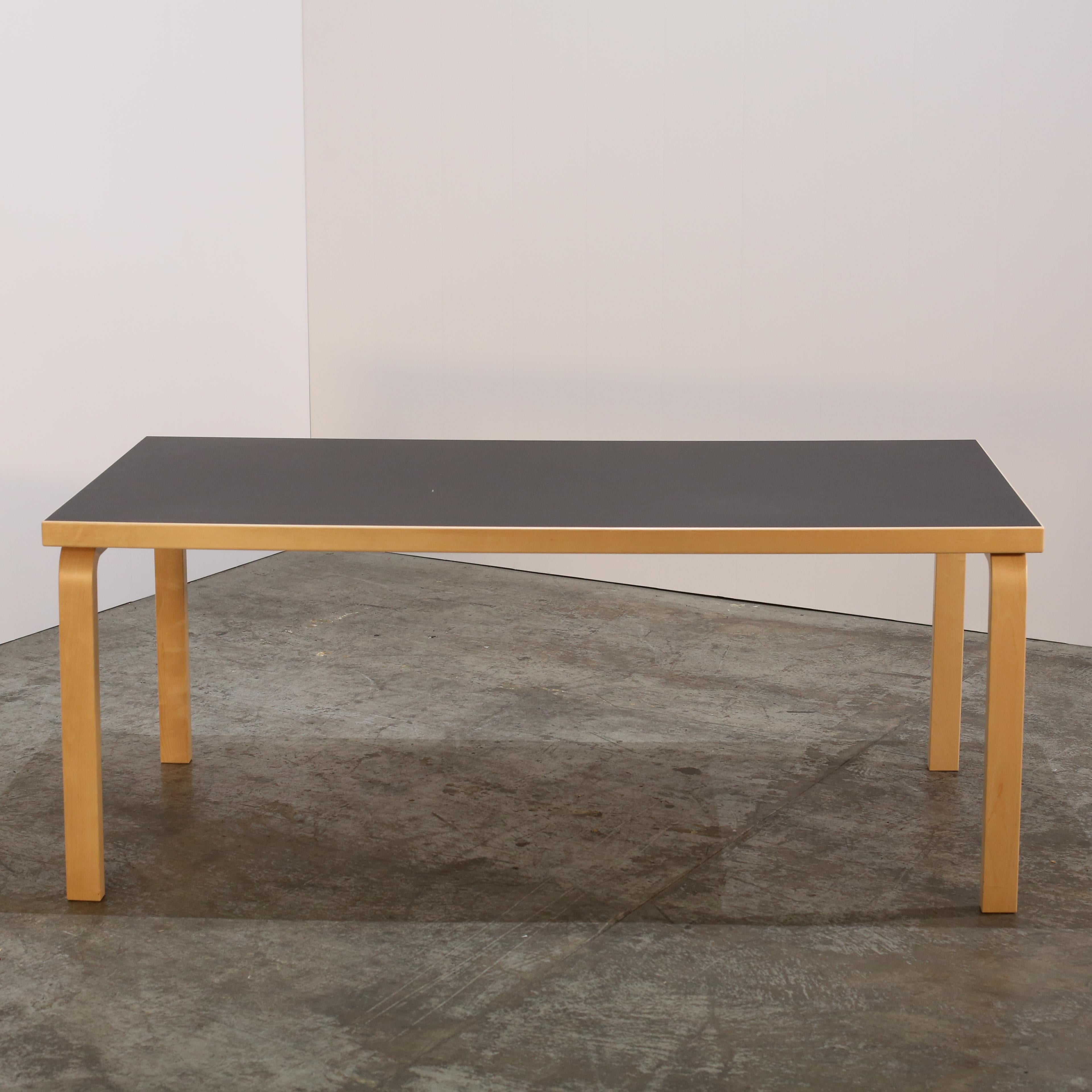 Introduce a touch of timeless elegance to your home with the Aalto 83 Table by Alvar Aalto for Artek. Crafted with the highest quality materials, this stunning piece features a sleek, minimalist design that seamlessly blends form and function. The