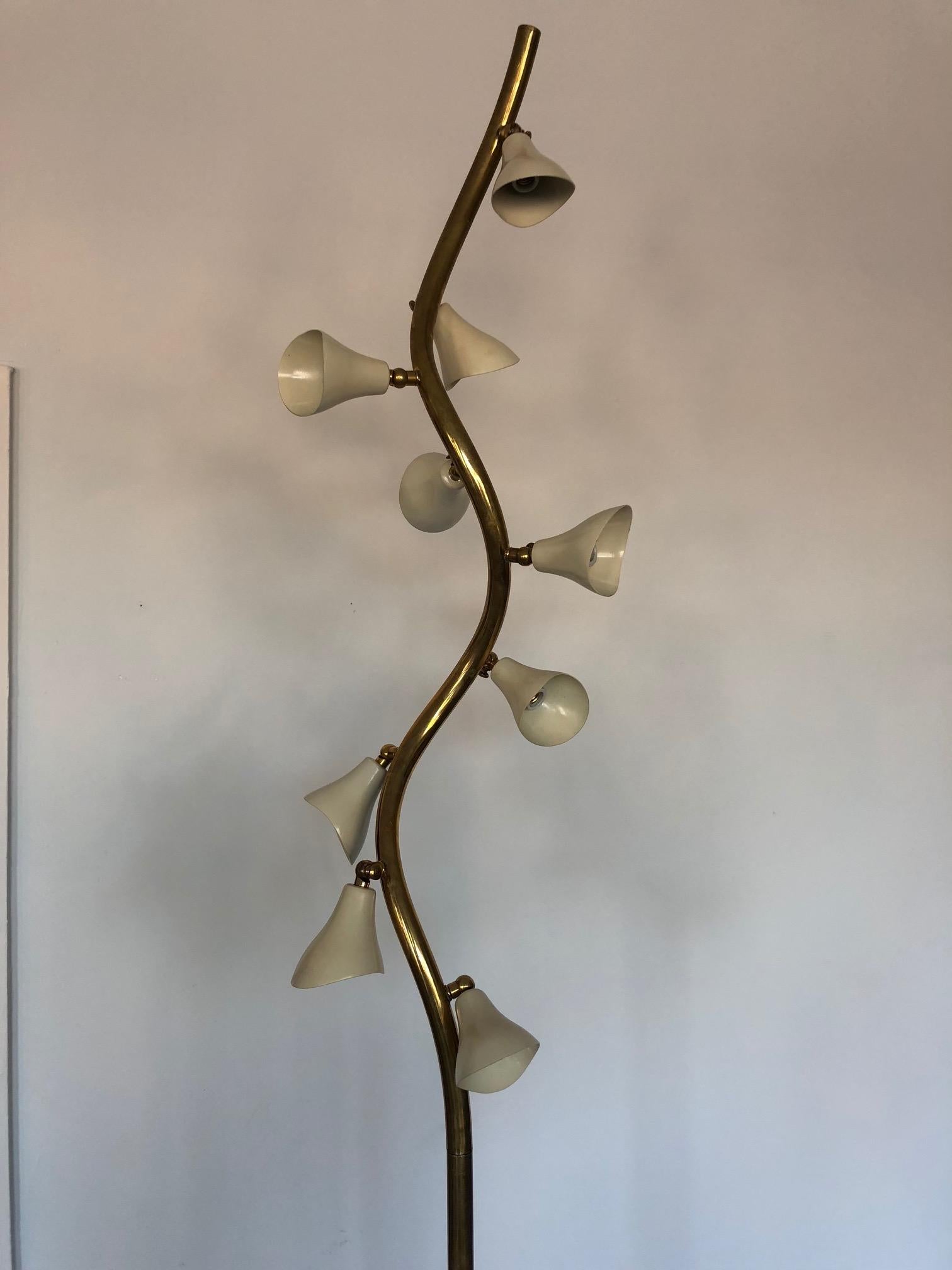 A rare and unusual floor lamp by Gino Sarfatti for Arteluce, model 1034. A tree form in polished brass, marble base, aluminum shades. Lamp is model 1034. 