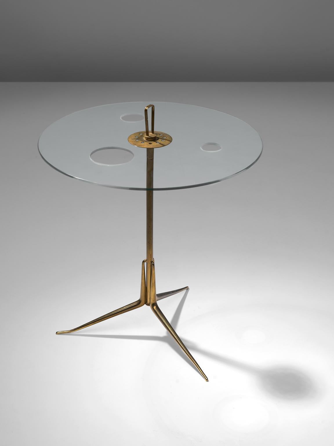 Arteluce, side table, glass and brass, Italy, 1950s

Arteluce brass and glass serving stand - An adjustable variation of this model Arteluce table was featured in the landmark exhibition 