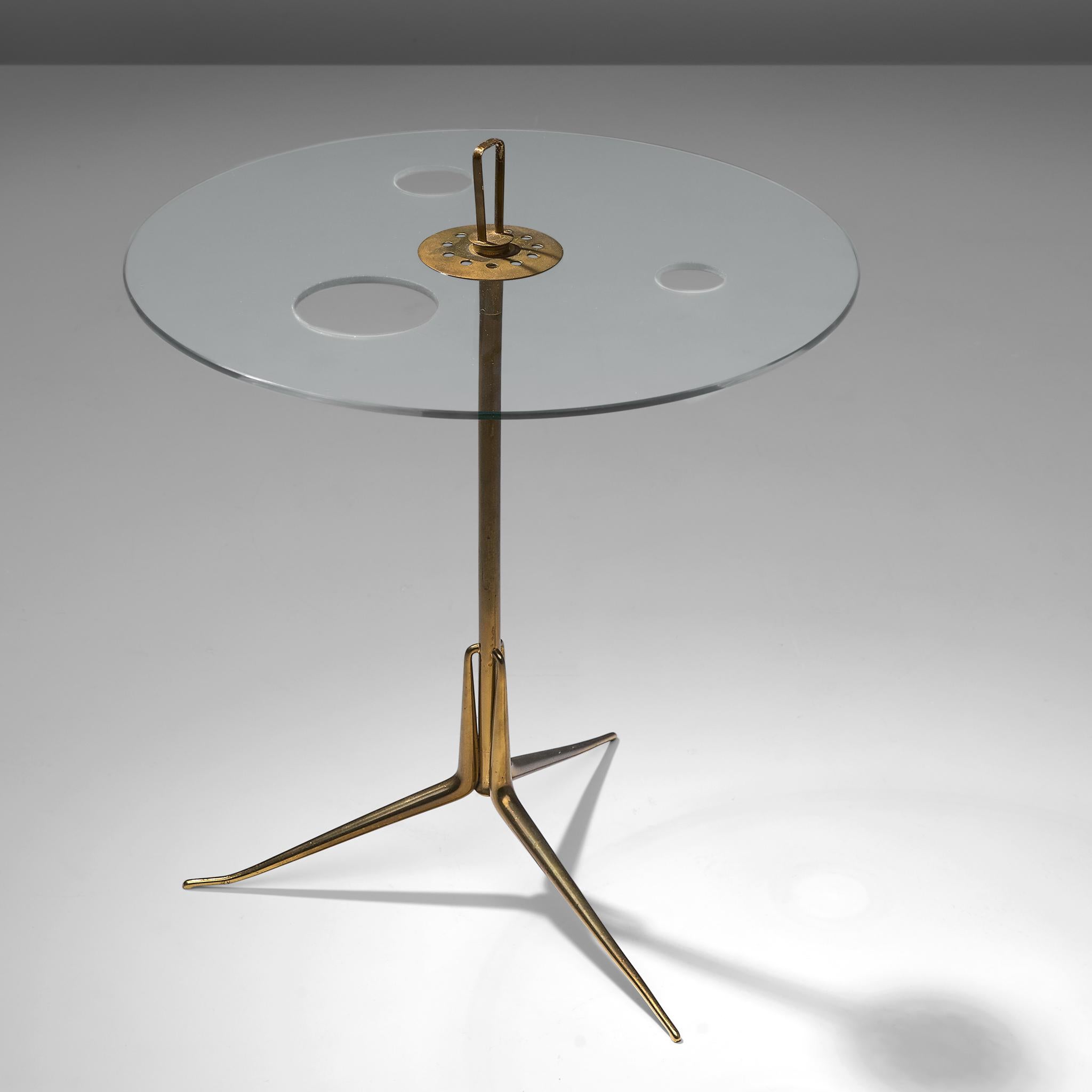 Arteluce, side table, glass and brass, Italy, 1950s

Arteluce brass and glass serving stand - An adjustable variation of this model Arteluce table was featured in the landmark exhibition 