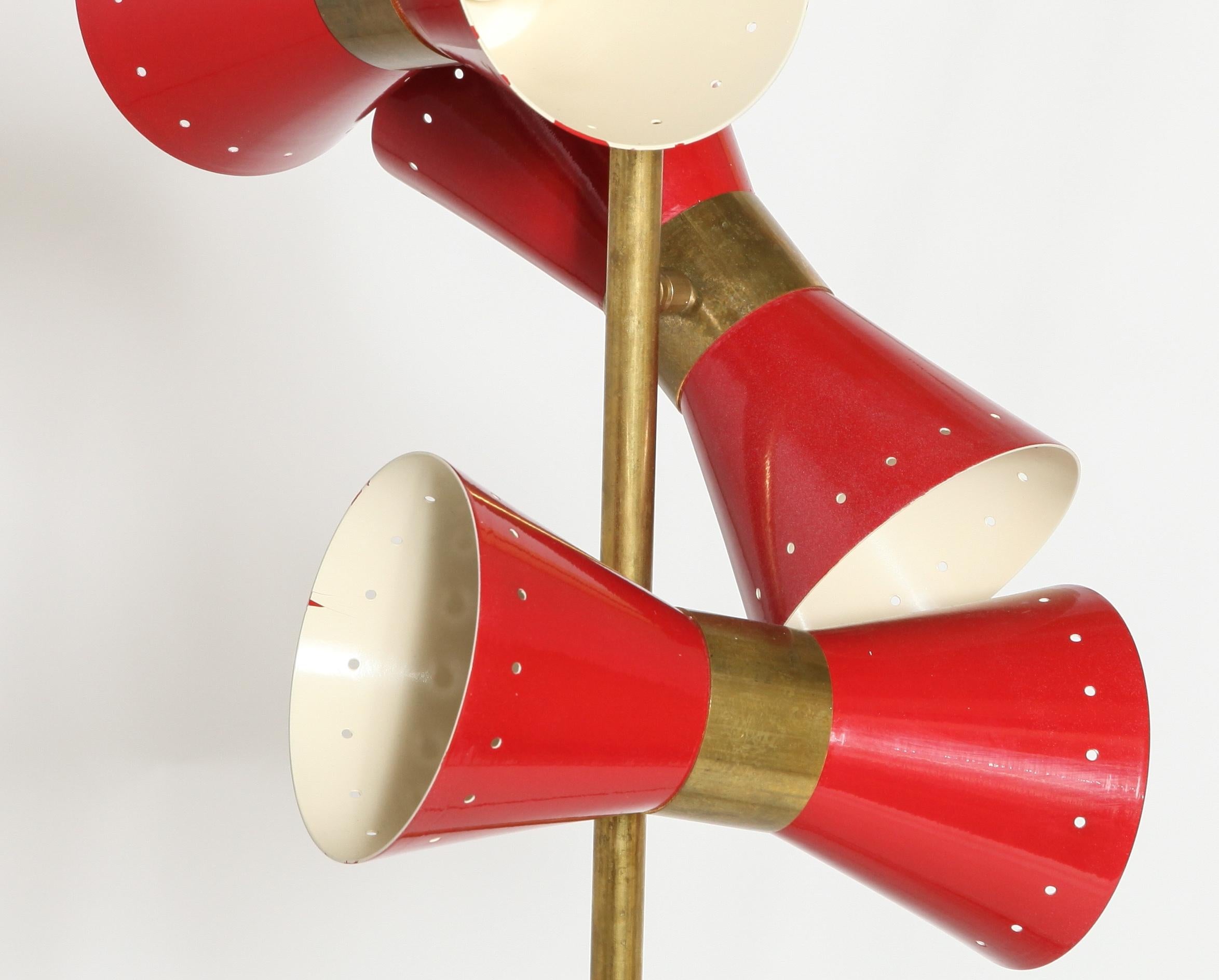Arteluce style Italian modern floor lamp with two independently adjustable stems and with white and red enameled metal conical shades. The piece has a marble base. In great vintage condition with age-appropriate wear and use.