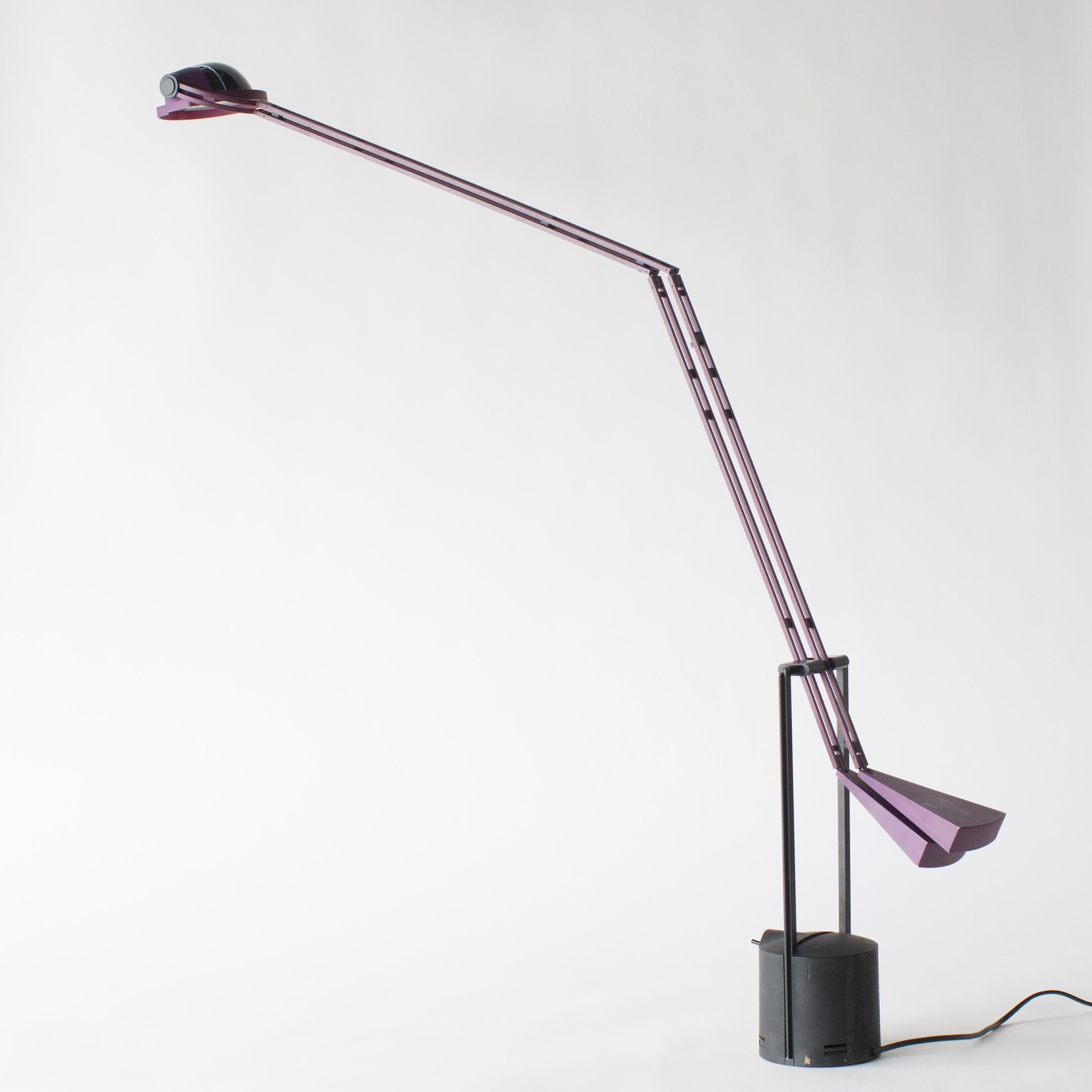 Zoom 50 desk lamp designed by King and Miranda for Arteluce.
Made of steel. Black and purple color combination.
Arm expands from 63 to 123 cm, base f 12.5 cm. For 220-240V use.