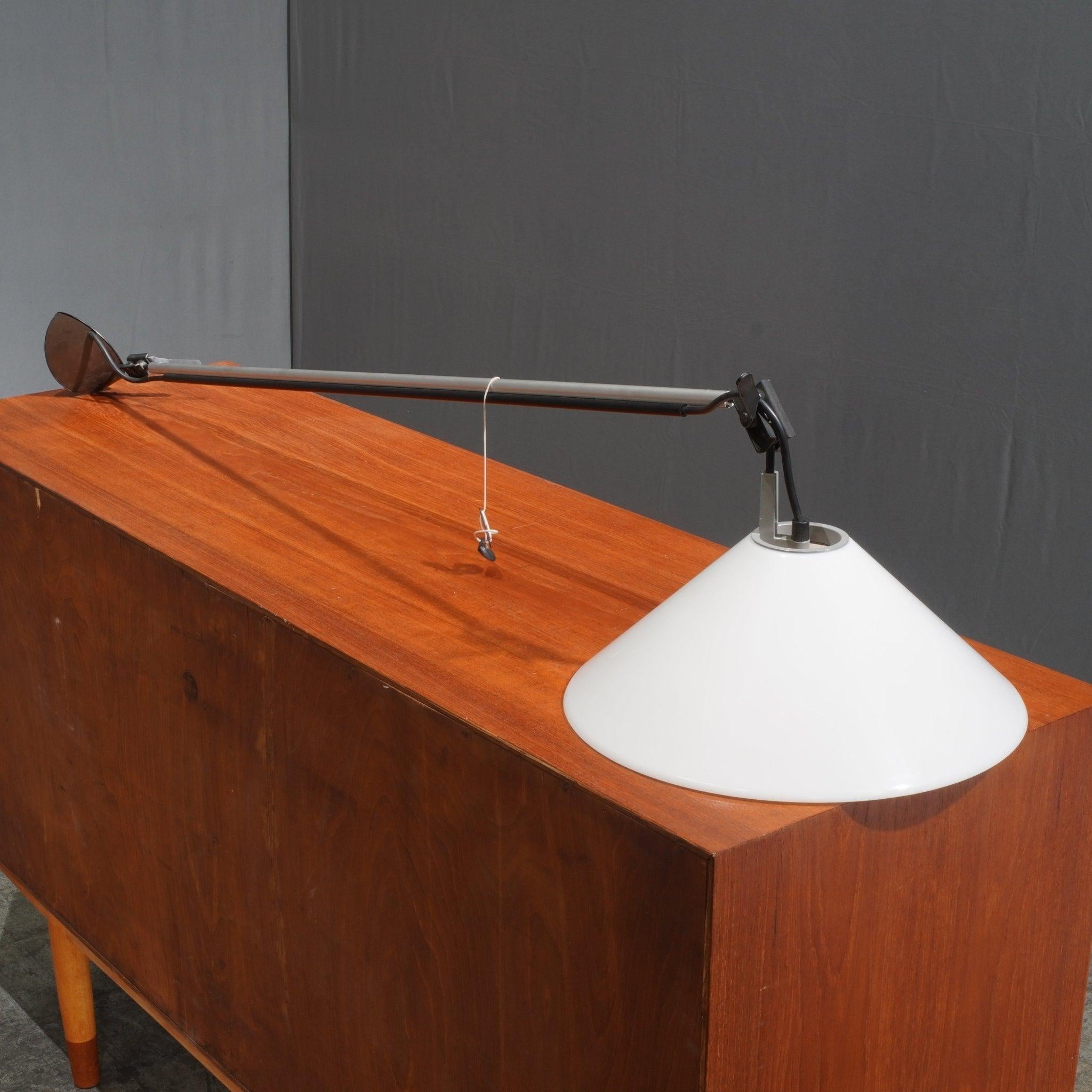 The Artemide Aggregato Braccio 110 by Enzo Mari is a quintessential embodiment of Italian design excellence. This wall lamp seamlessly blends functionality with minimalist aesthetics, creating a timeless lighting solution. Its sleek and adjustable