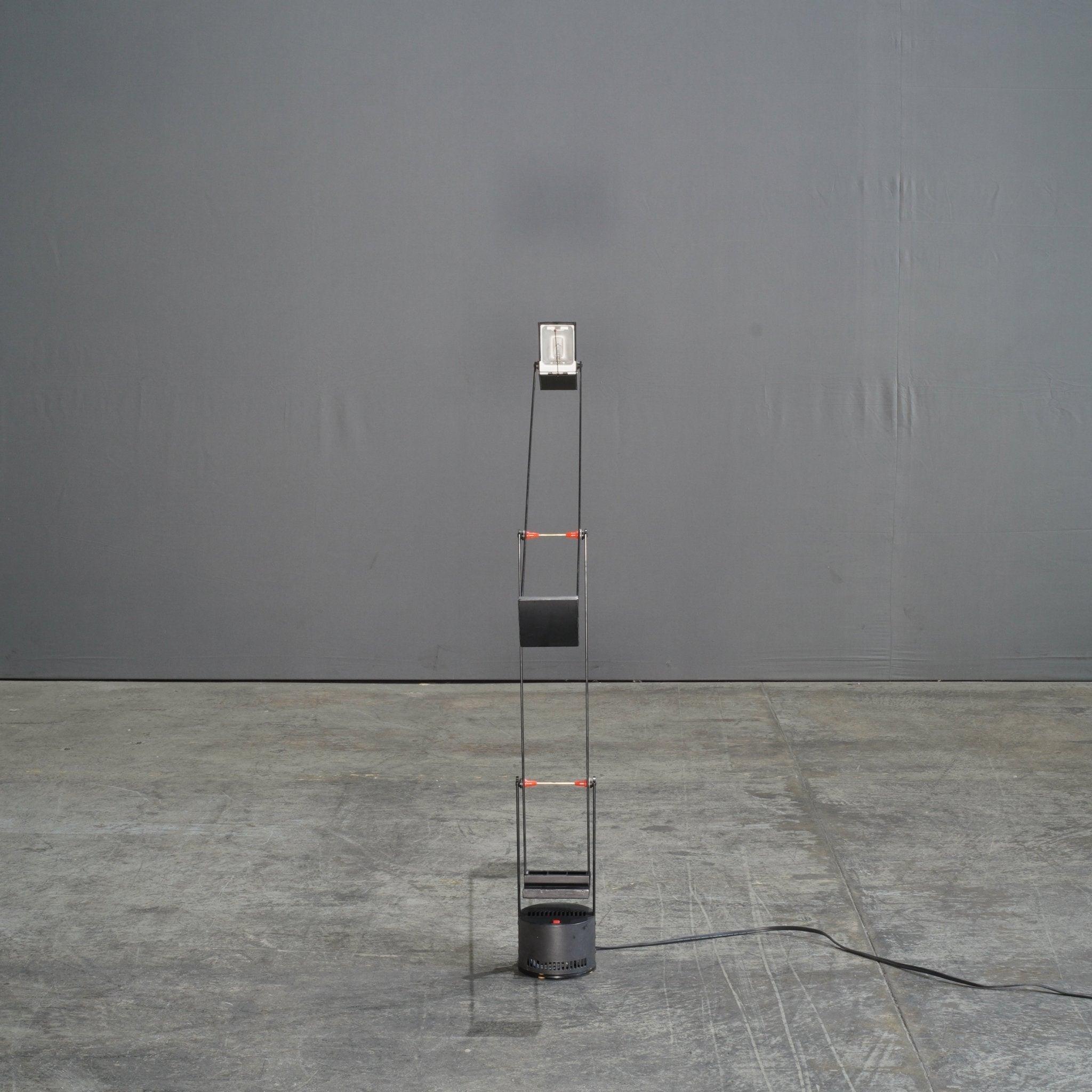 The Artemide Black Tizio Lamp by Richard Sapper is an icon of modern design, celebrated for its minimalist aesthetic and ingenious functionality. Introduced in 1972, this sleek, counterbalanced lamp uses low-voltage halogen bulbs and a unique