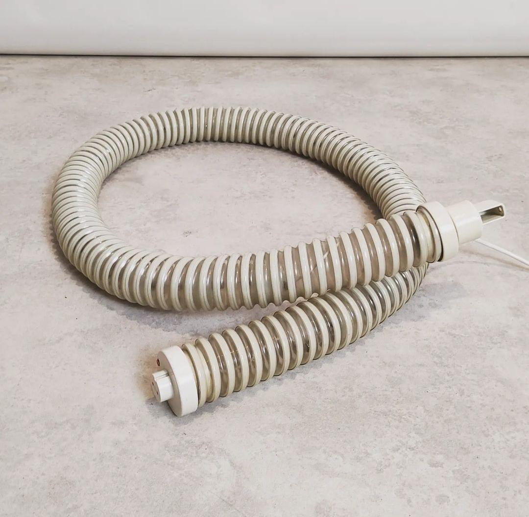 This rare original Artemide Boalum lamp, design by Livio Castiglioni e Gianfranco Frattini around 60s and 70s.
This Is One of most particular lamp for that know-how periodo, It can be placed in the most stranger way, twisted or hanging, straight  or