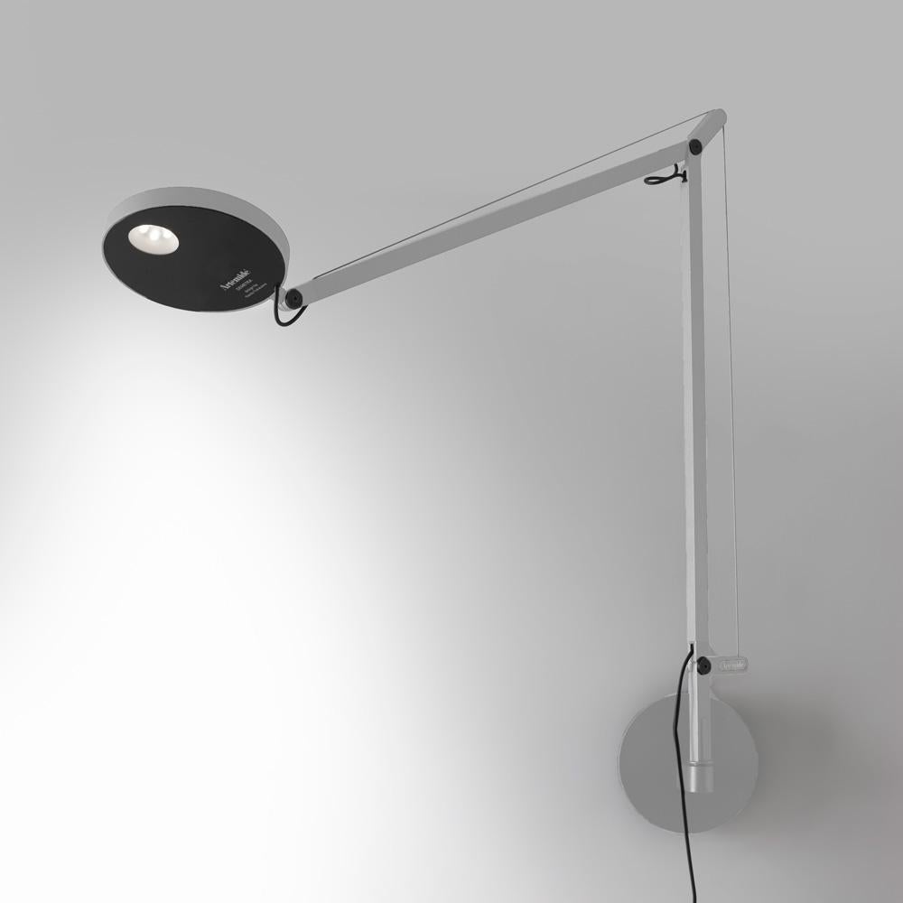 Simple in concept, Demetra has an adjustable, turnable and tiltable head with integrated dimmer switch atop an extending arm allowing for direct LED light diffusion. Made of aluminum painted white, grey anthracite or titanium. In addition to table,
