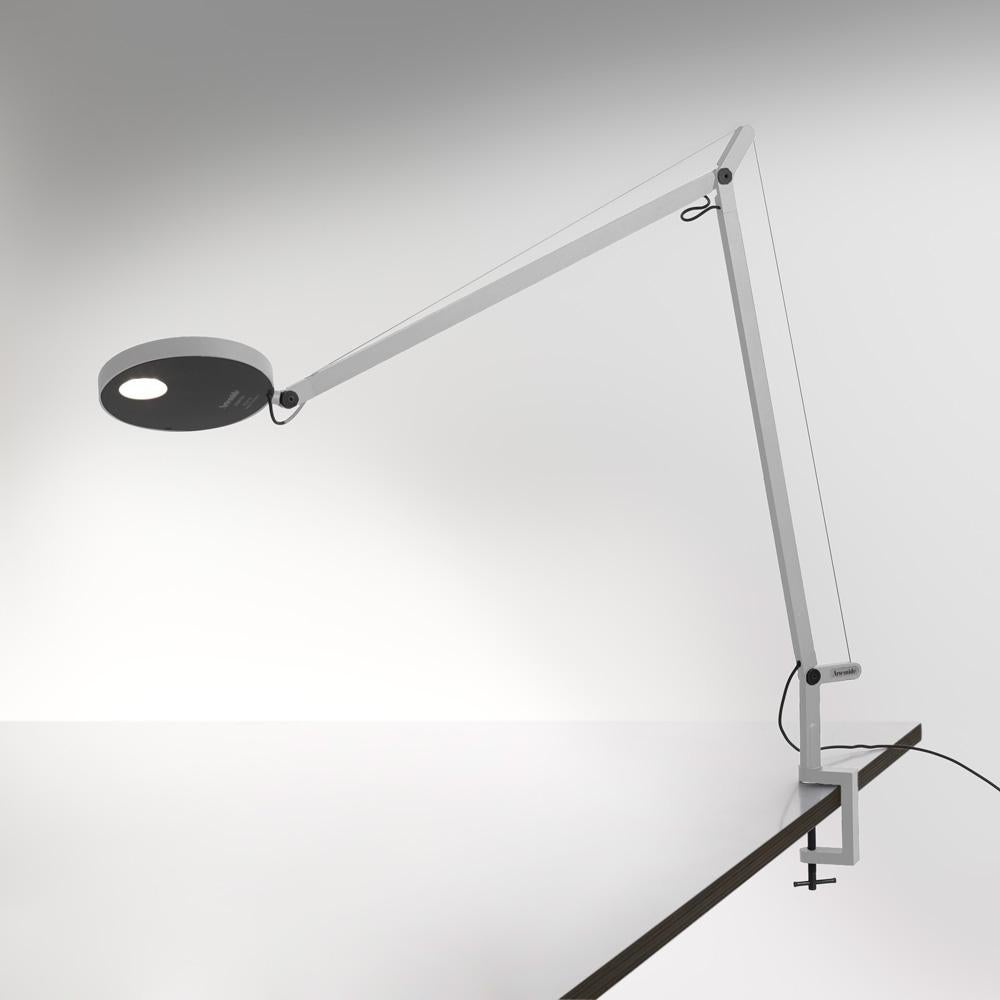 Simple in concept, Demetra has an adjustable, turnable and tiltable head with integrated dimmer switch atop an extending arm allowing for direct LED light diffusion. 

Made of aluminum painted white, grey anthracite or titanium. In addition to