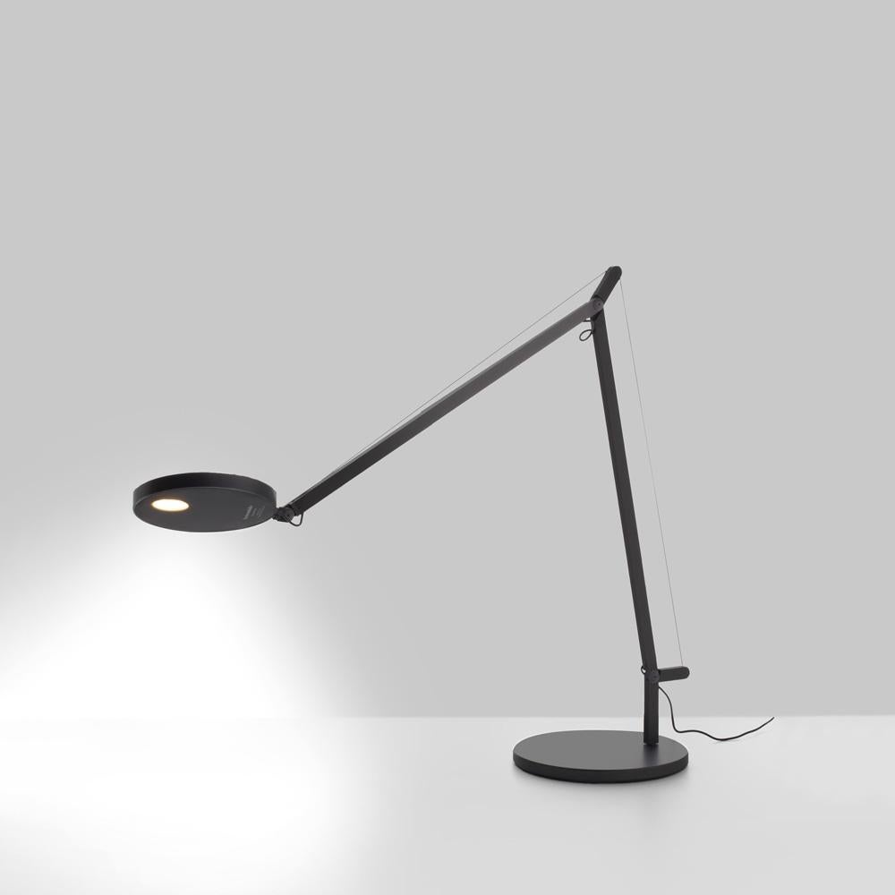 Simple in concept, Demetra has an adjustable, turnable and tiltable head with integrated dimmer switch atop an extending arm allowing for direct LED light diffusion. Made of aluminum painted white, grey anthracite or titanium. In addition to table,