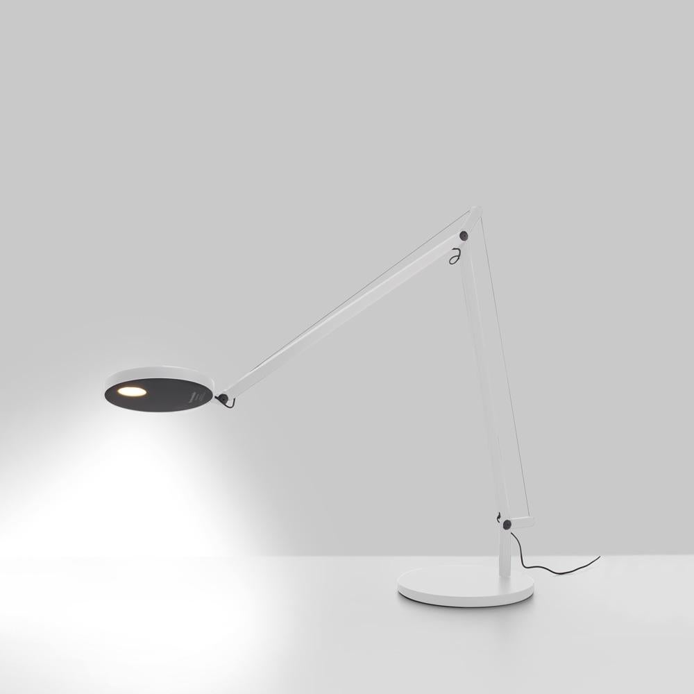 Simple in concept, Demetra has an adjustable, turnable and tiltable head with integrated dimmer switch atop an extending arm allowing for direct LED light diffusion. Made of aluminum painted white, grey anthracite or titanium. In addition to table,