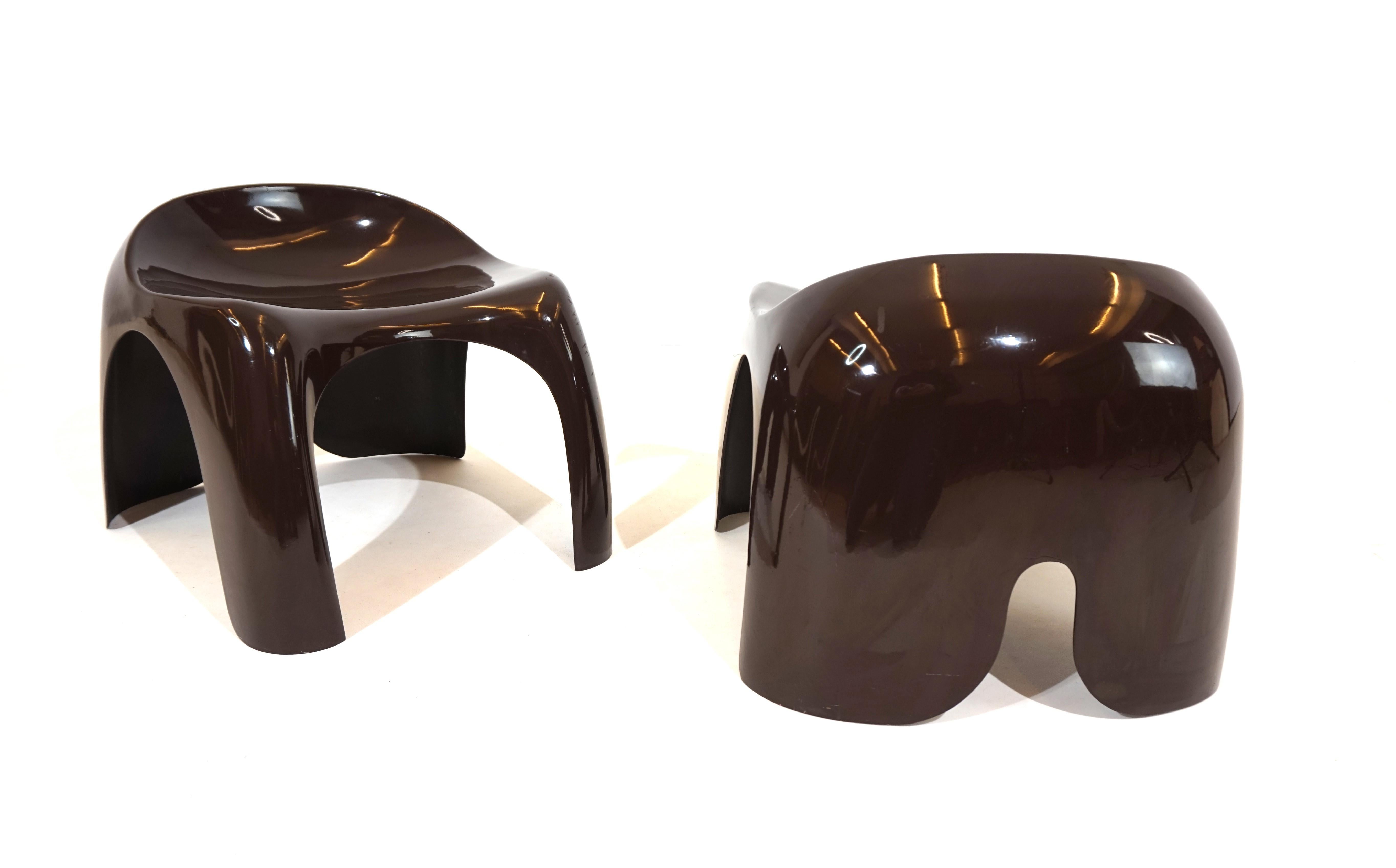 A chocolate brown pair of Efebo stools in good condition. The plastic bowls are in good condition apart from a few scratches on the corner of a stool.  These low seaters are stackable. In their design, worthy representatives of the Space Age.


