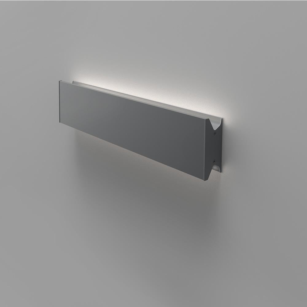 Wall or ceiling mounted luminaire for direct, indirect or direct/indirect lighting.

Extruded aluminum body in textured white or textured anthracite finish with aluminum end caps matched to body. Available in four lengths.

Fixture is designed to