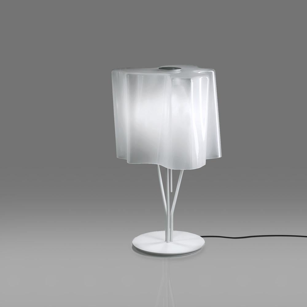 Inspired by the rays of light as they diffuse through the atmosphere, Logico’s blown-glass diffuser takes an organic shape used throughout the collection. 

Logico Mini & Classic are now available in three color options : milky white, smoky grey, or