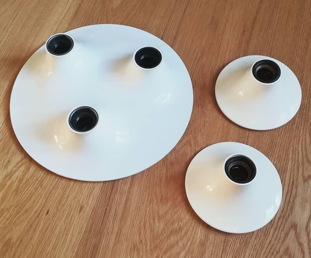 Stunning set of Artemide flush fixtures featuring two Teti and Triteti ceiling or wall lights in white. Designer by Vico Magistretti for Artemide in 1967. Triteti was produced for a very short time and is quite to find on the market. Gorgeous