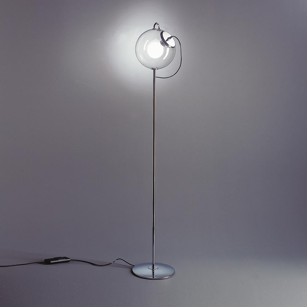 A hand-blown glass globe of light on a base and stem of polished chrome. Transparent yet created a softly diffused, dimmable light. 

A design statement, the Miconos fixture is designed to complement either modern or more traditional interiors. 
Its