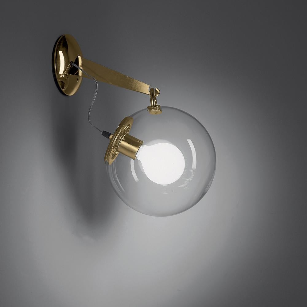 A hand blown glass globe of light on a base and stem of polished chrome. Transparent yet created a softly diffused, dimmable light. A design statement, the Miconos fixture is designed to complement either modern or more traditional interiors. Its