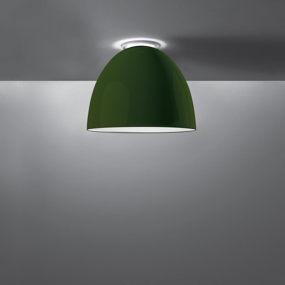 A system for the metamorphosis of light, Nur creates indirect light accompanied by a subtle “halo” effect on the ceiling. 
Aluminum molded body, polycarbonate lower diffuser, upper cap is transparent borosilicate glass. 

Nur ceiling is available in