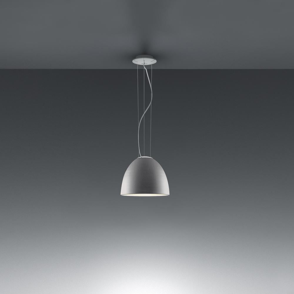 A system for the metamorphosis of light, Nur Suspension has a sleek, contemporary dome shape that provides direct downlighting, with a sanded glass top that also allows a softer, more subtle diffused light to escape. Nur creates indirect light