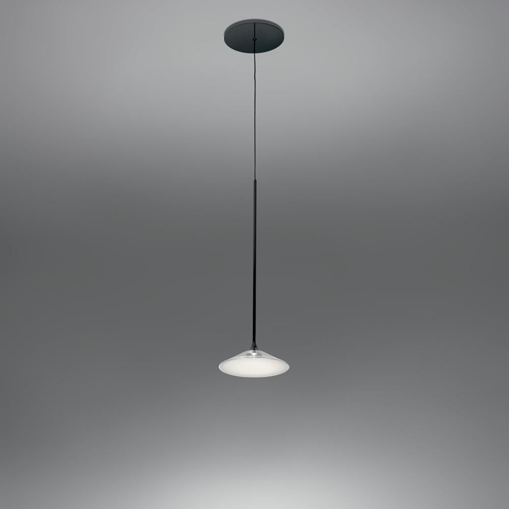 Orsa is the embodiment of precision. An elegant pendant light pared down to its essential elements, Orsa allows the light to express a larger volume.
A slim metal stem flares out at one end to form the heat-sink and housing for the LED, with a UV