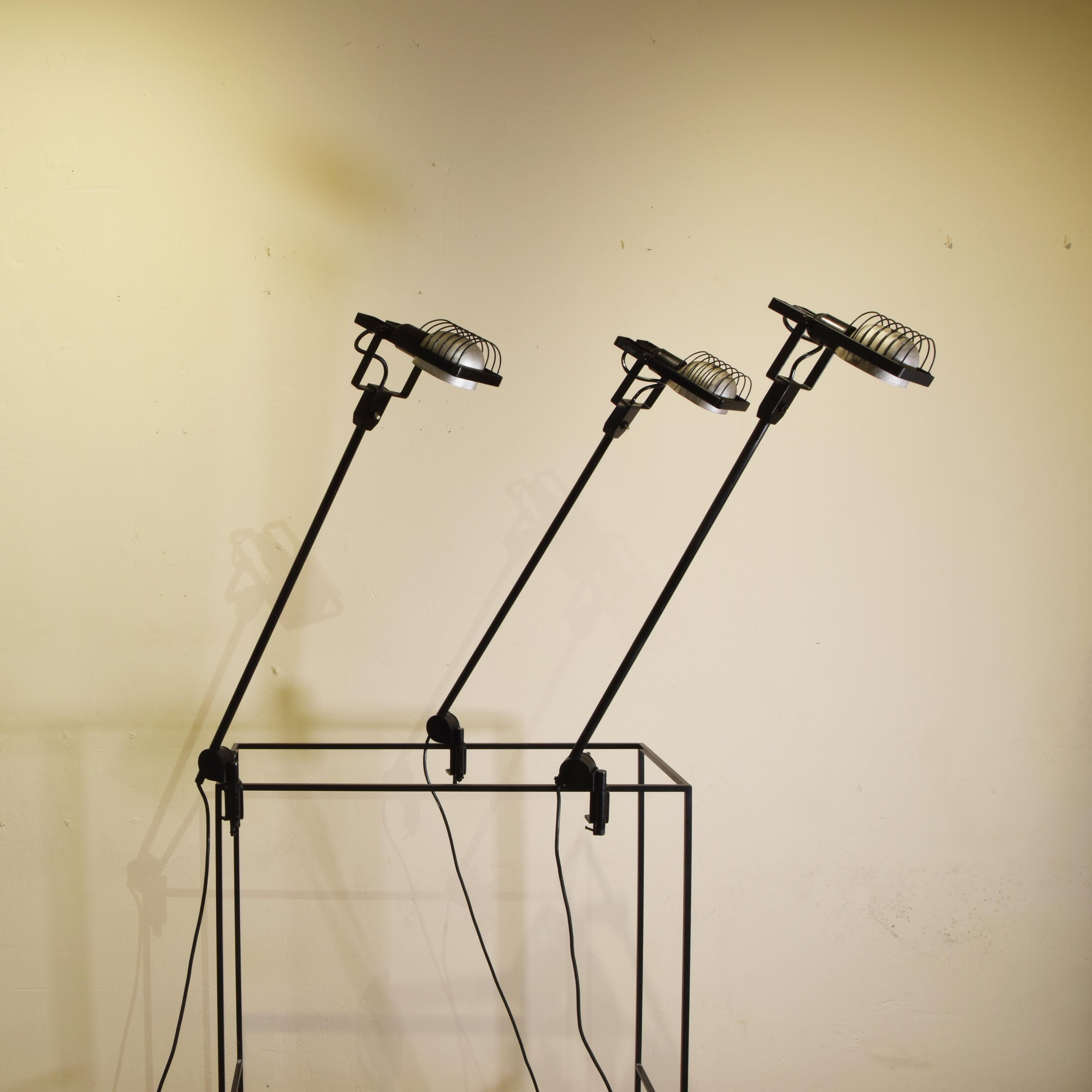 Black synthesis set of tree desk lamps by Ernesto Gismondi for Artemide 1970s.