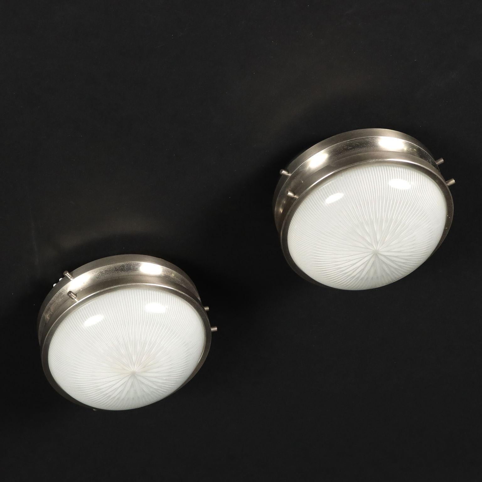 Pair of wall/ceiling lamps; metal and aluminum, glass.