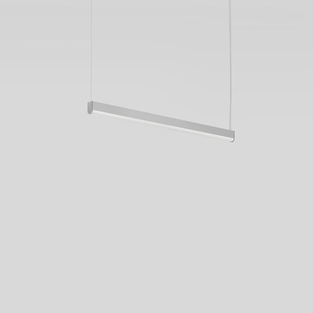 Simple LED suspension lighting with steel cables for direct or direct/indirect lighting.

The body is constructed of extruded aluminum with a clear, anodized matte finish and aluminum end caps in a grey powder coat finish.

The diffuser is made of