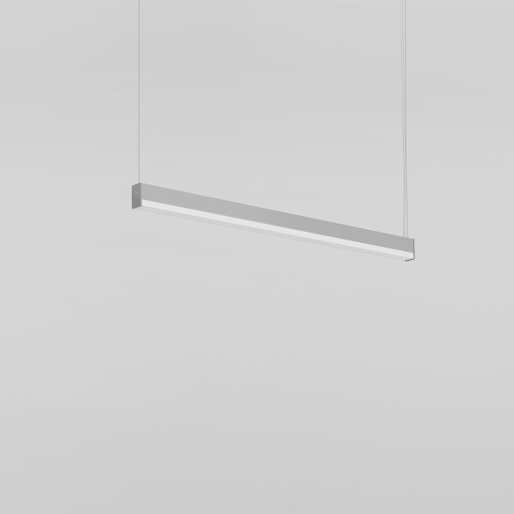 Simple LED suspension lighting with steel cables for direct or direct/indirect lighting.

The body is constructed of extruded aluminum with a clear, anodized matte finish and aluminum end caps in a grey powder coat finish.

The diffuser is made of