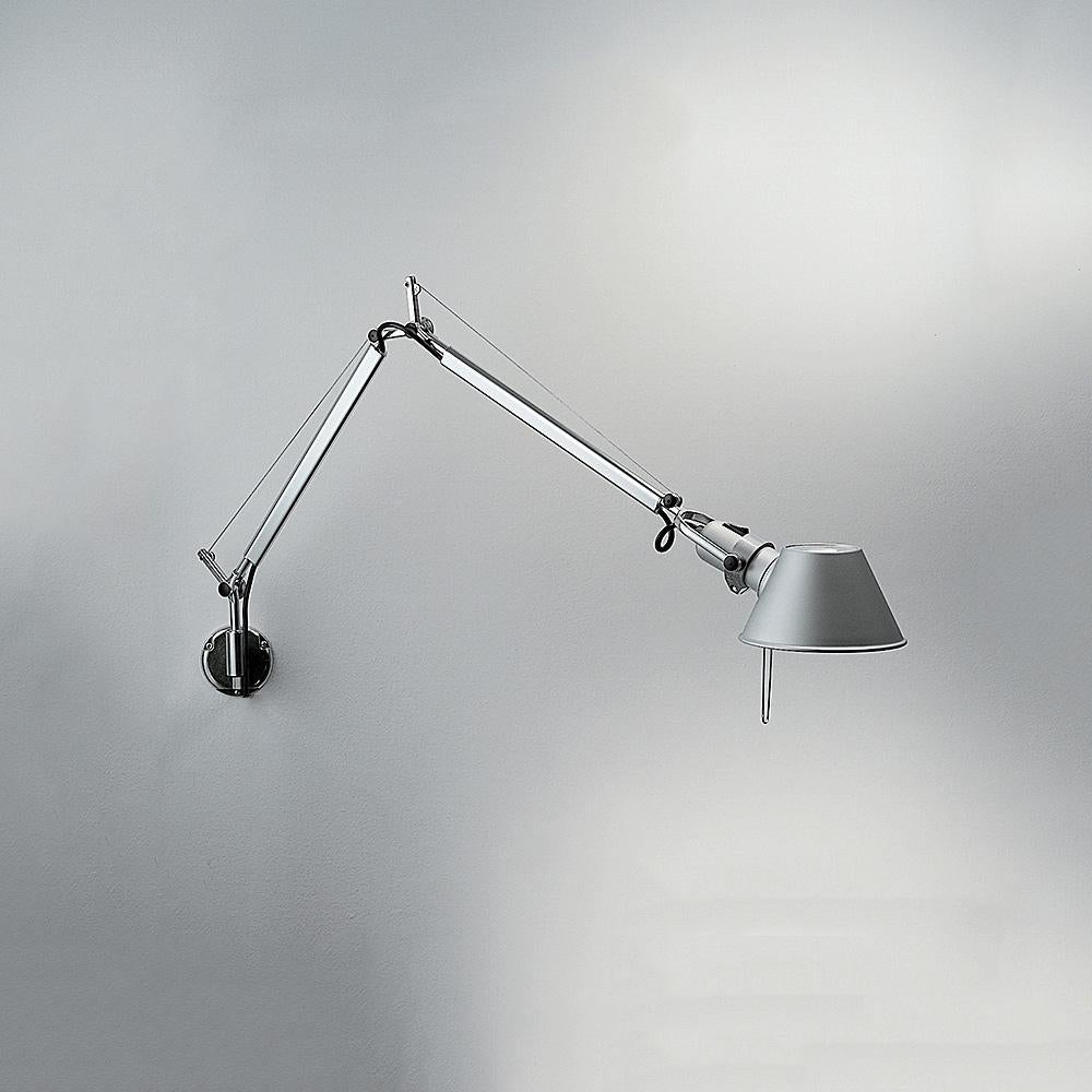 An extension to the iconic Tolomeo family, Tolomeo wall combines the body of the Tolomeo table lamp with a surface or j-box mounting wall support, allowing for a wall lighting solution that provides flexibility and style.

Bulb not included. Only