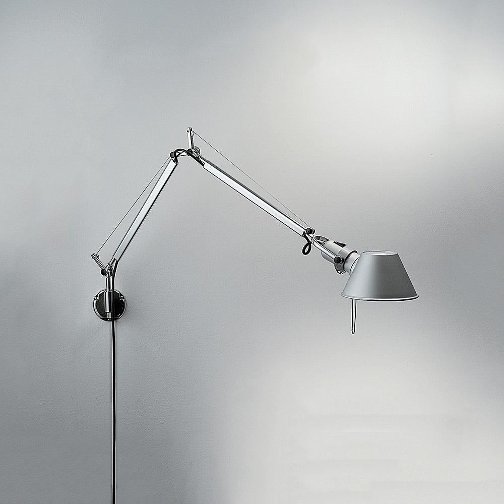 An extension to the iconic Tolomeo family, Tolomeo wall combines the body of the Tolomeo table lamp with a surface or j-box mounting wall support, allowing for a wall lighting solution that provides flexibility and style.

Bulb not included. Only
