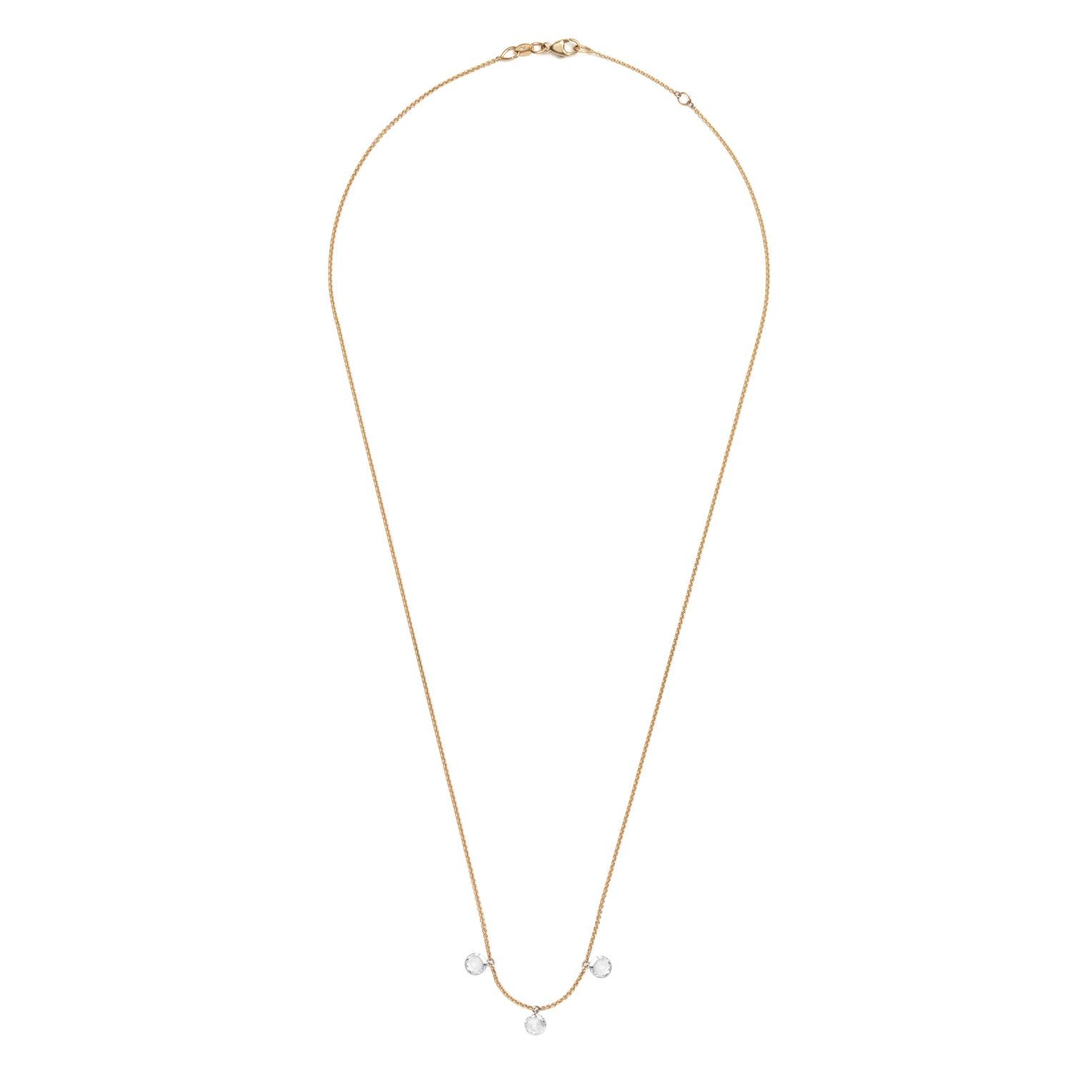 Three pierced rose cut diamonds float on a 14k yellow gold chain resulting in this perfect everyday necklace. Works great to layer with other necklaces or on its own. 

Diamond carat weight: 0.6 - 0.65 carats
Diamond quality: F-color, VS+