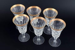 Artemisia. Five red wine glasses in crystal with 24-carat gold decoration.