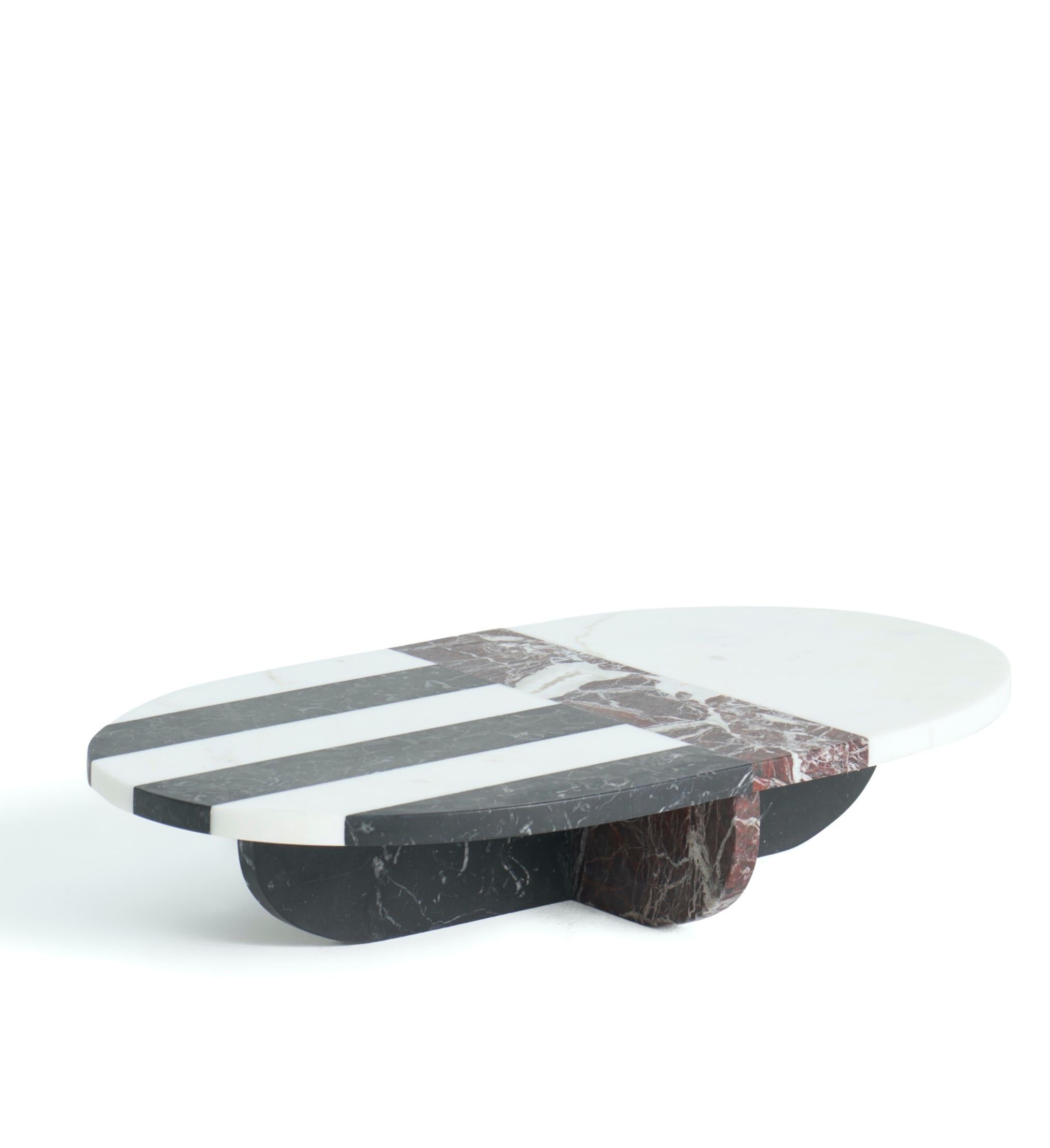 Artemisia marble centerpiece by Matteo Cibic
Dimensions: 23.6 x 13.8 x 4.7 cm
Materials:
Bianco
Michelangelo,
Rosso Levanto,
Nero Marquinia

Please note that the Cibic pieces with “ears” or tray handles are ornamental and not functional. 
Use them