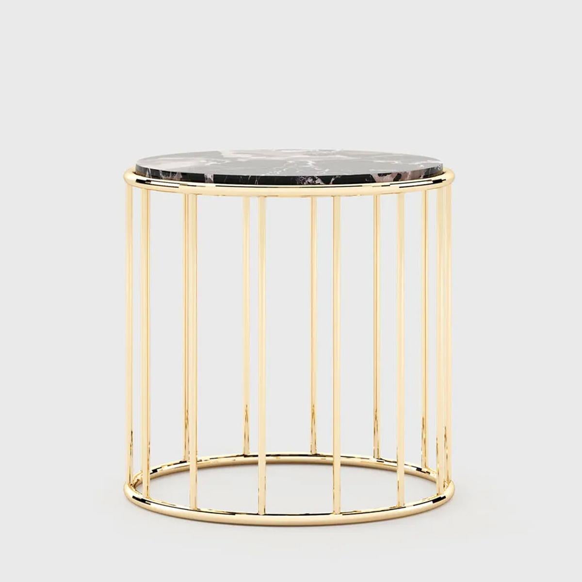 Side Table Arteum with polished marble top
and with polished stainless steel structure ingold finish.
Also available in other finishes on request, including 
up-charges according to finishes.