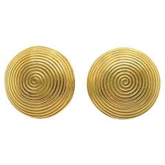 Artful Clip-earrings in 18 Karat yellow gold with Spiral Pattern
