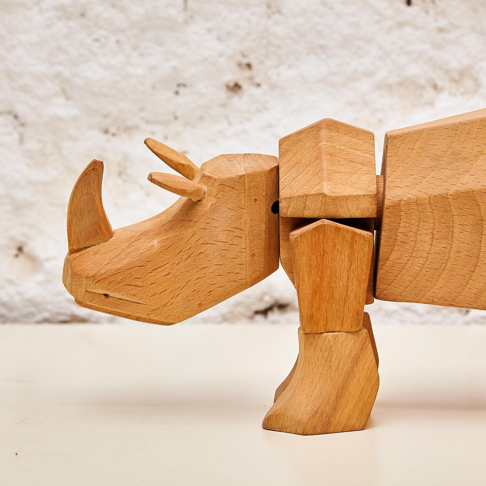 Artful Mastery: Solid Wood Rhino Sculpture 'Areaware' by David Weeks Studio 4