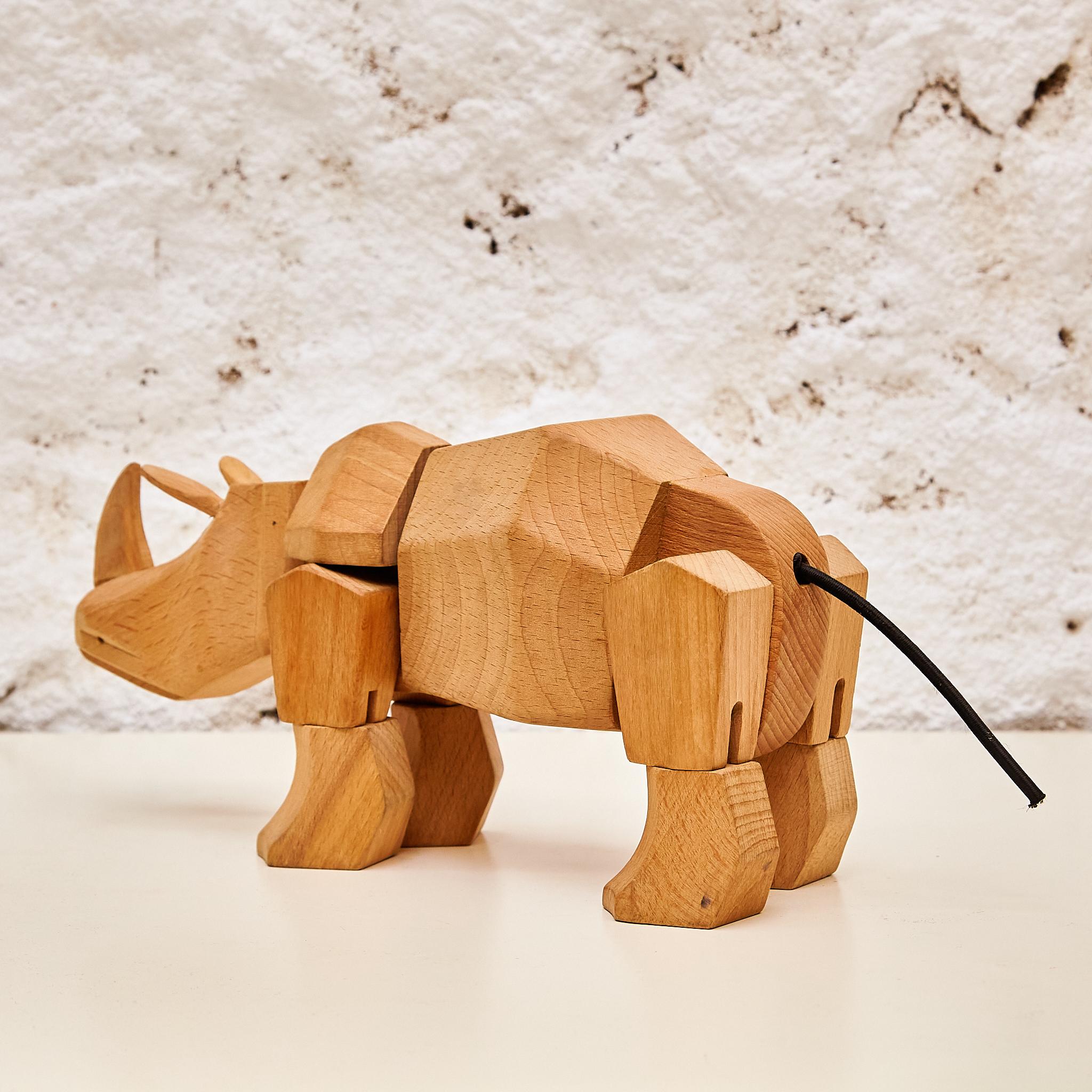 Artful Mastery: Solid Wood Rhino Sculpture 'Areaware' by David Weeks Studio 1
