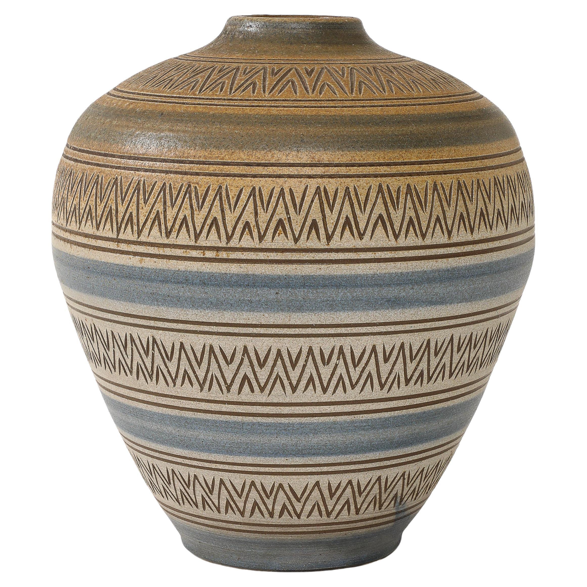 Large Floor Lamp inn Excellent Condition with a beautiful Sand and Blue color and incised motif, signed.