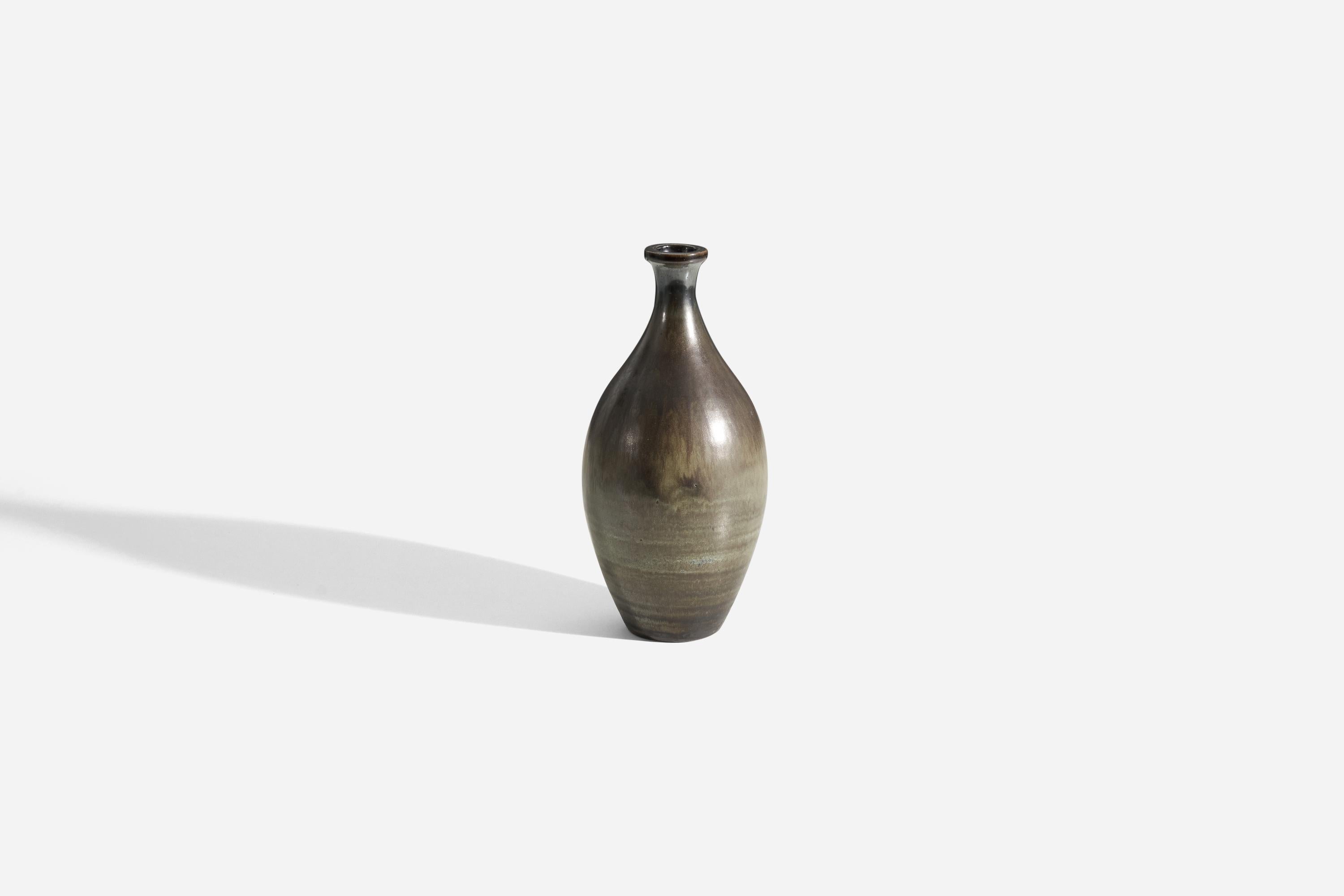 A green, brown, and gray glazed stoneware vase designed by Arthur Andersson, and produced by Wallåkra Keramik, Sweden, 1950s.


 