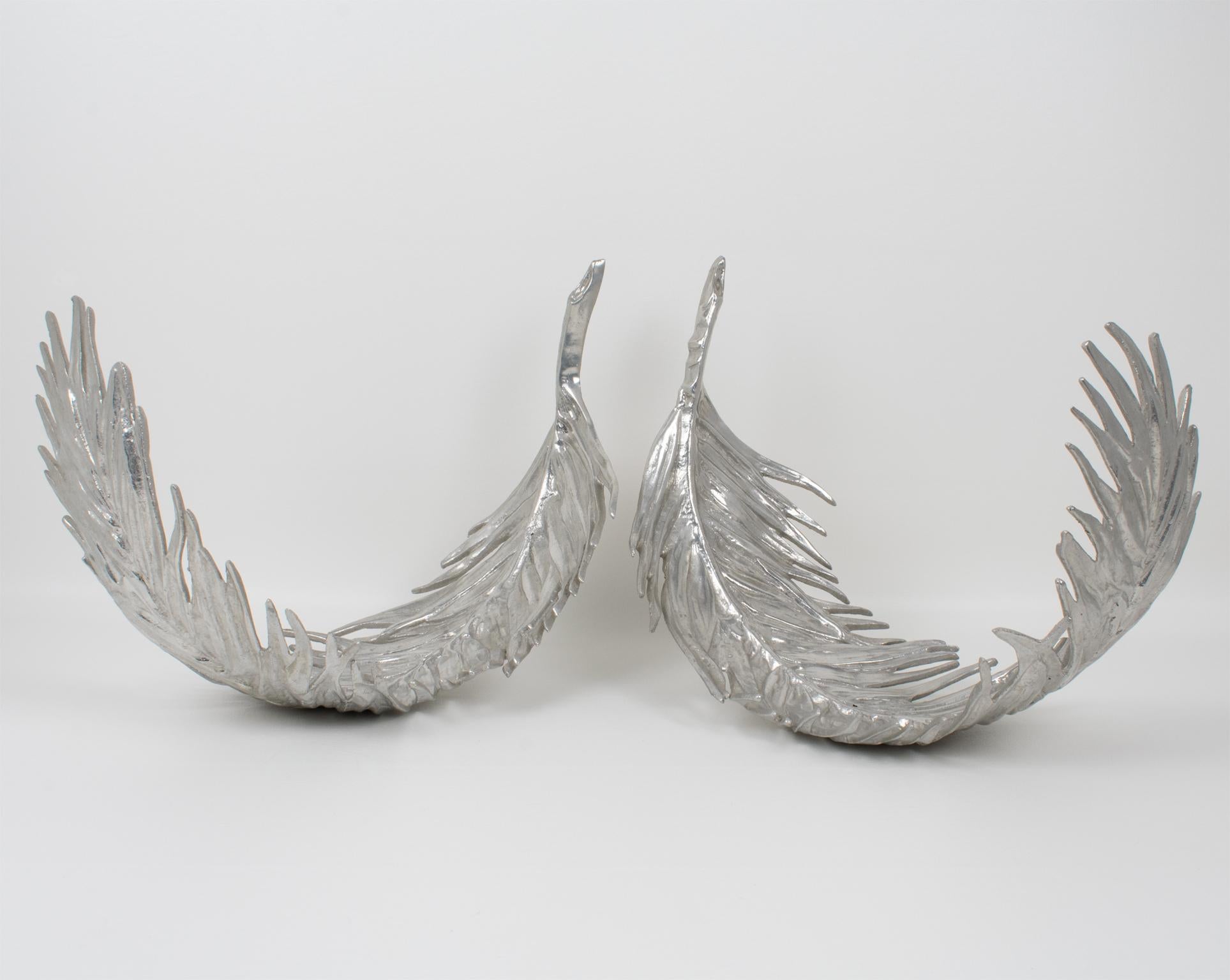 These outstanding aluminum palm frond centerpieces are rare finds from Arthur Court's (1928-2015) production. A highly decorative set of two polished cast aluminum trays featuring palm tree leaves. These pieces are oversized and impressive in